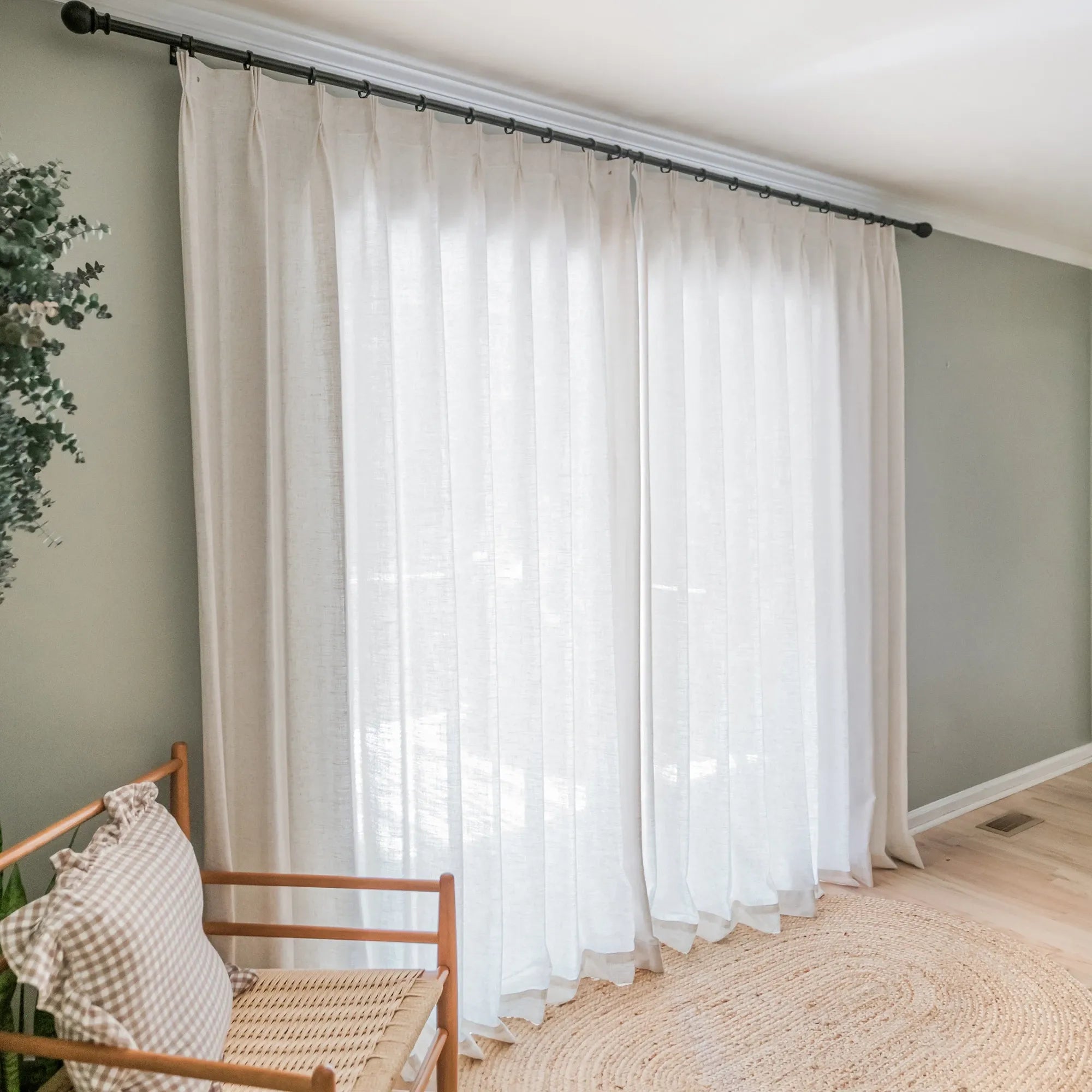 Amara linen curtains elegant light-filtering drapes fully drawn in living room img-9 showcasing the curtains' complete coverage and cozy ambiance in a living room