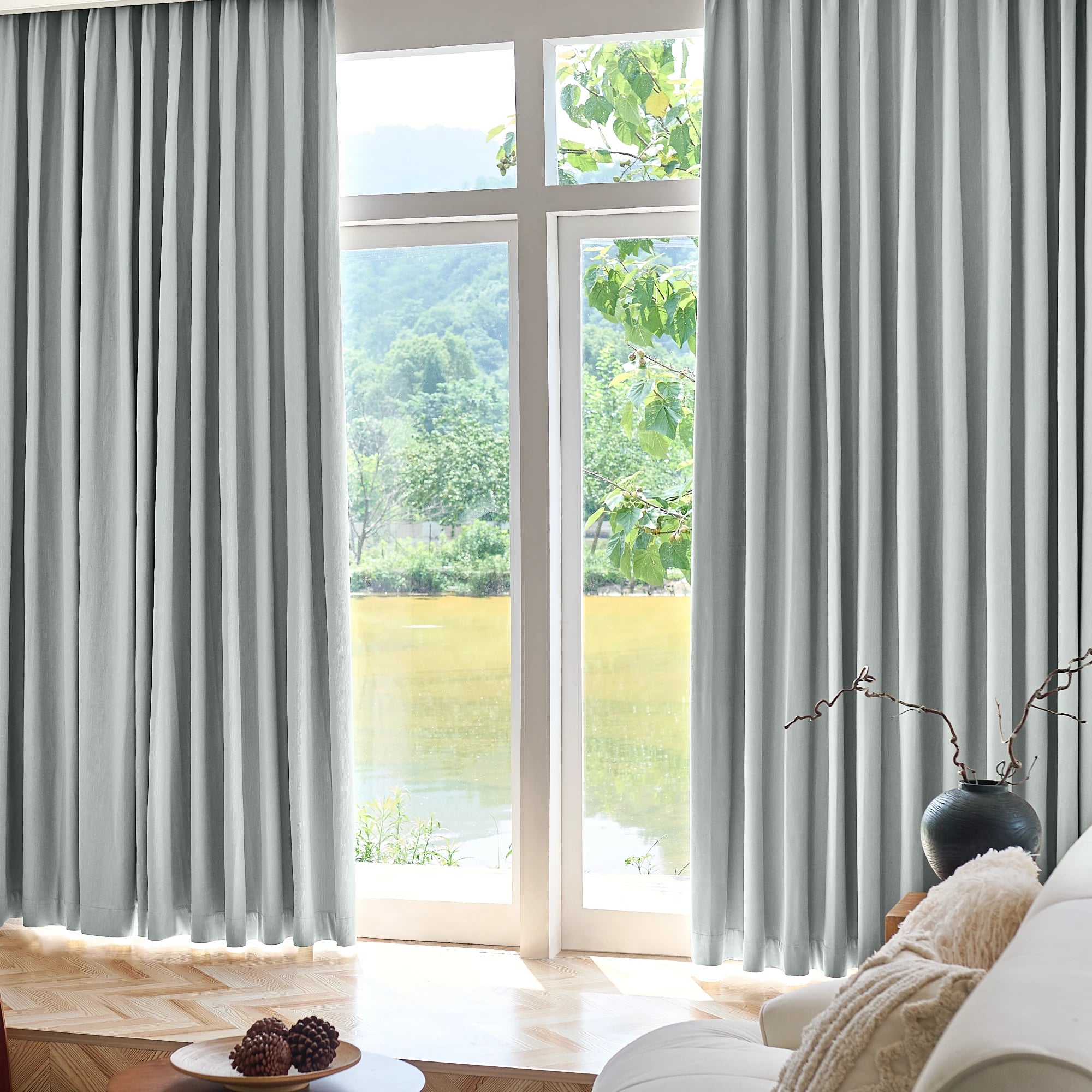 Brynna OY16-318-2_scene_2 100% Blackout Devoré Velvet Drapes in a modern home interior with elegant drape and luxurious texture