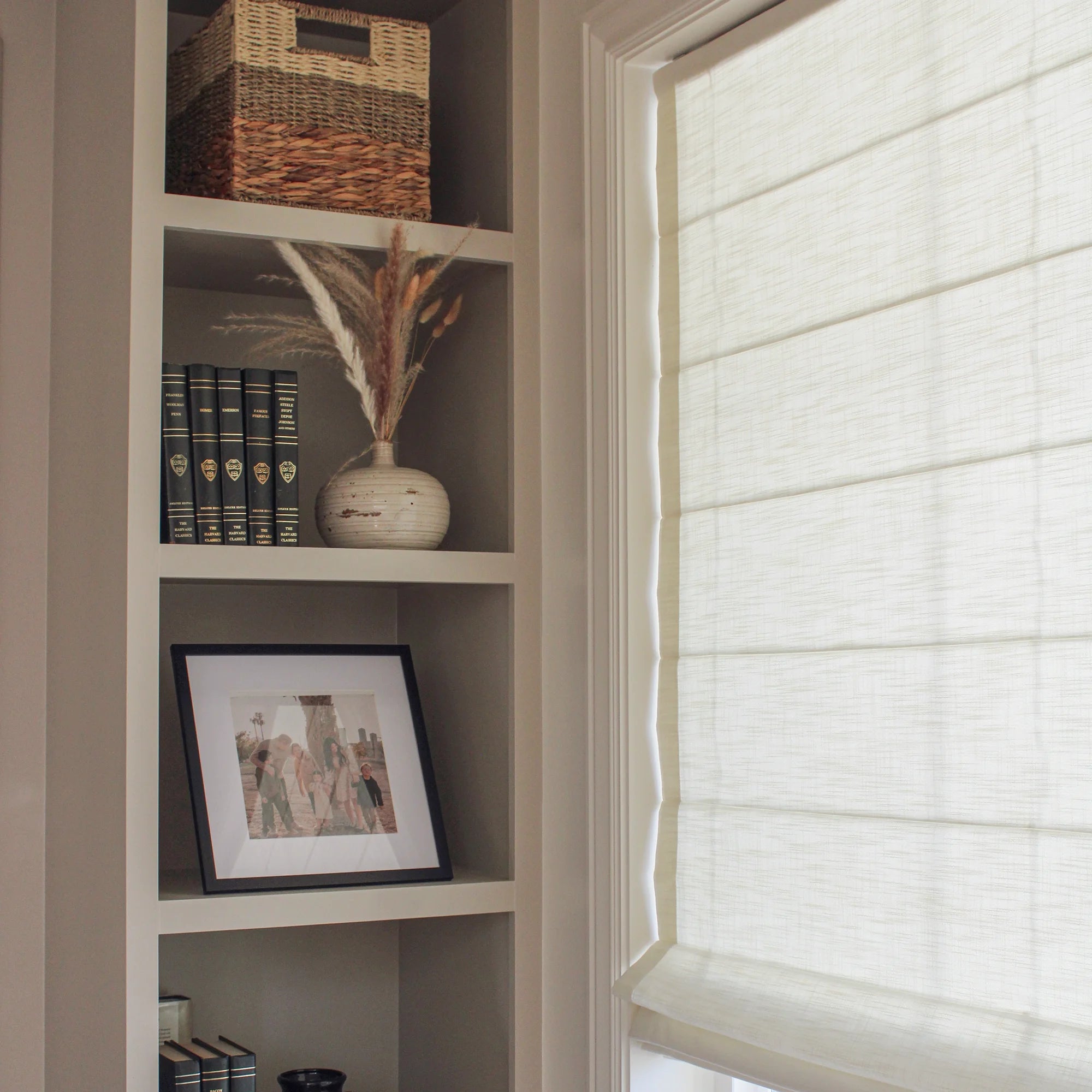 Celina 8823-1-6 Roman Shades – Elegant Pleated Drape, showcasing smooth fabric and elegant folded window display