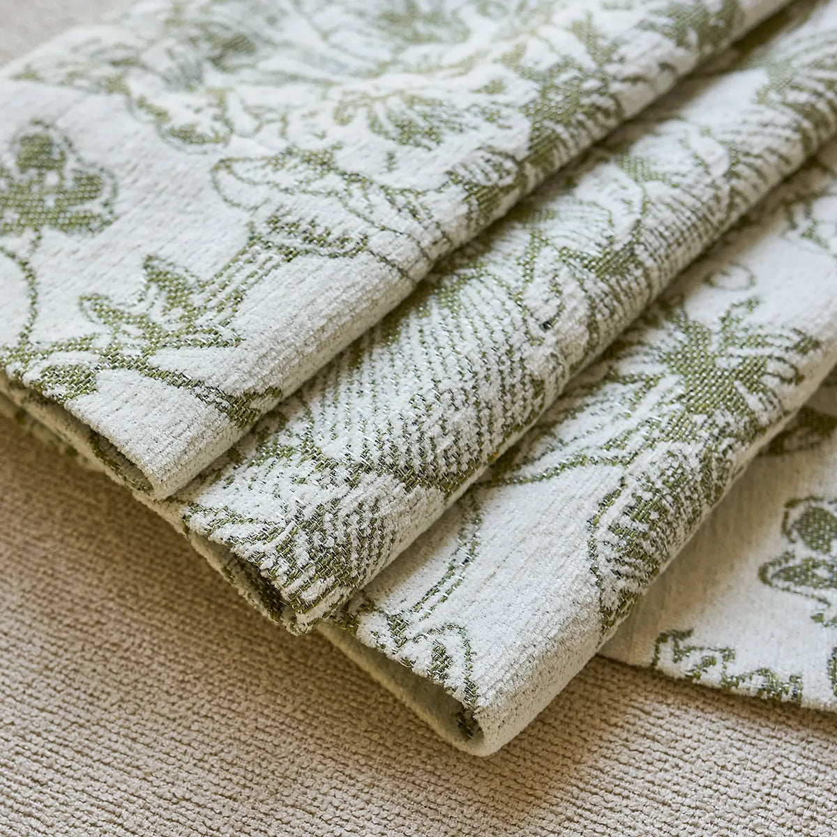 Cymbel H-002_detail_2 green vintage floral jacquard chenille blackout drapes close-up showing detailed floral pattern and soft chenille texture