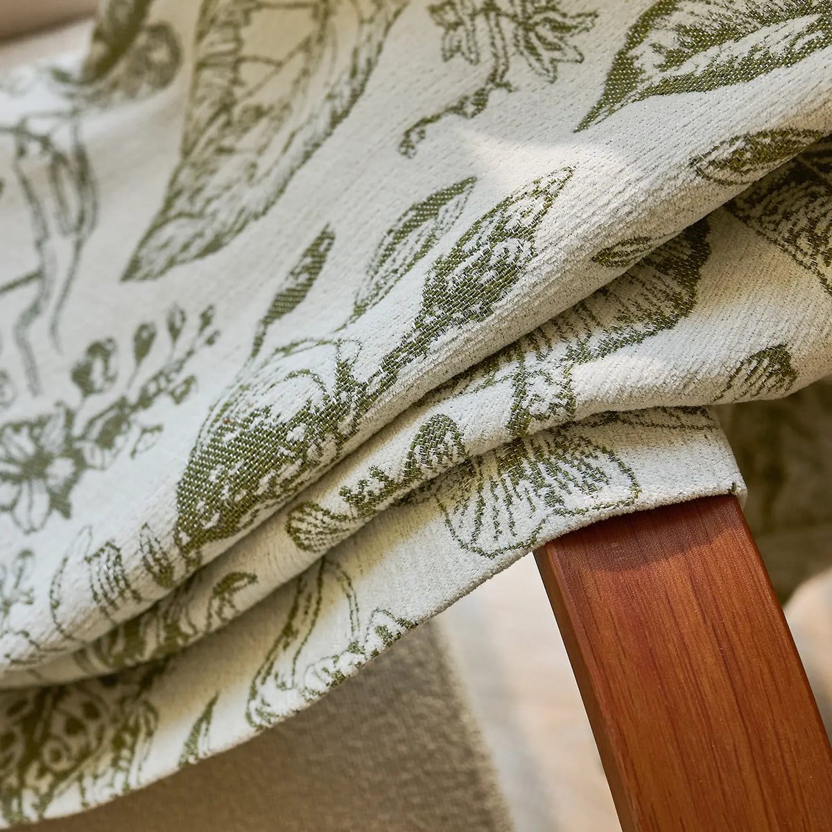 Cymbel H-002_scene_12 green vintage floral jacquard chenille blackout drapes, styled in a bright living room setting showcasing full window coverage and elegant home decor