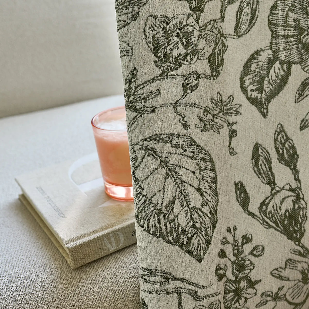 Cymbel H-002_scene_13 green vintage floral jacquard chenille blackout drapes, styled in a bright living room setting showcasing full window coverage and elegant home decor