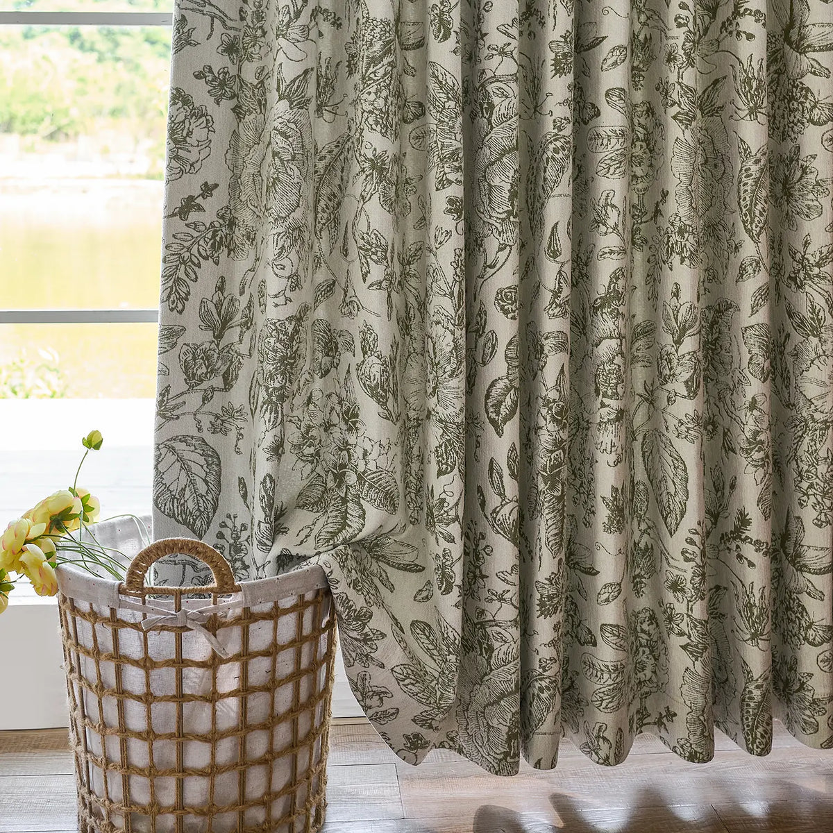 Cymbel H-002_scene_5 green vintage floral jacquard chenille blackout drapes, styled in a bright living room setting showcasing full window coverage and elegant home decor