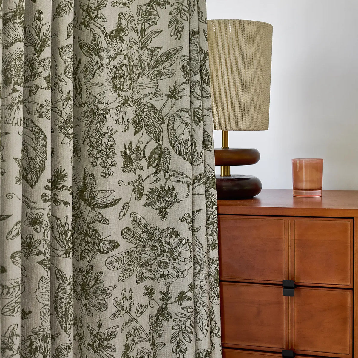 Cymbel H-002_scene_6 green vintage floral jacquard chenille blackout drapes, styled in a bright living room setting showcasing full window coverage and elegant home decor