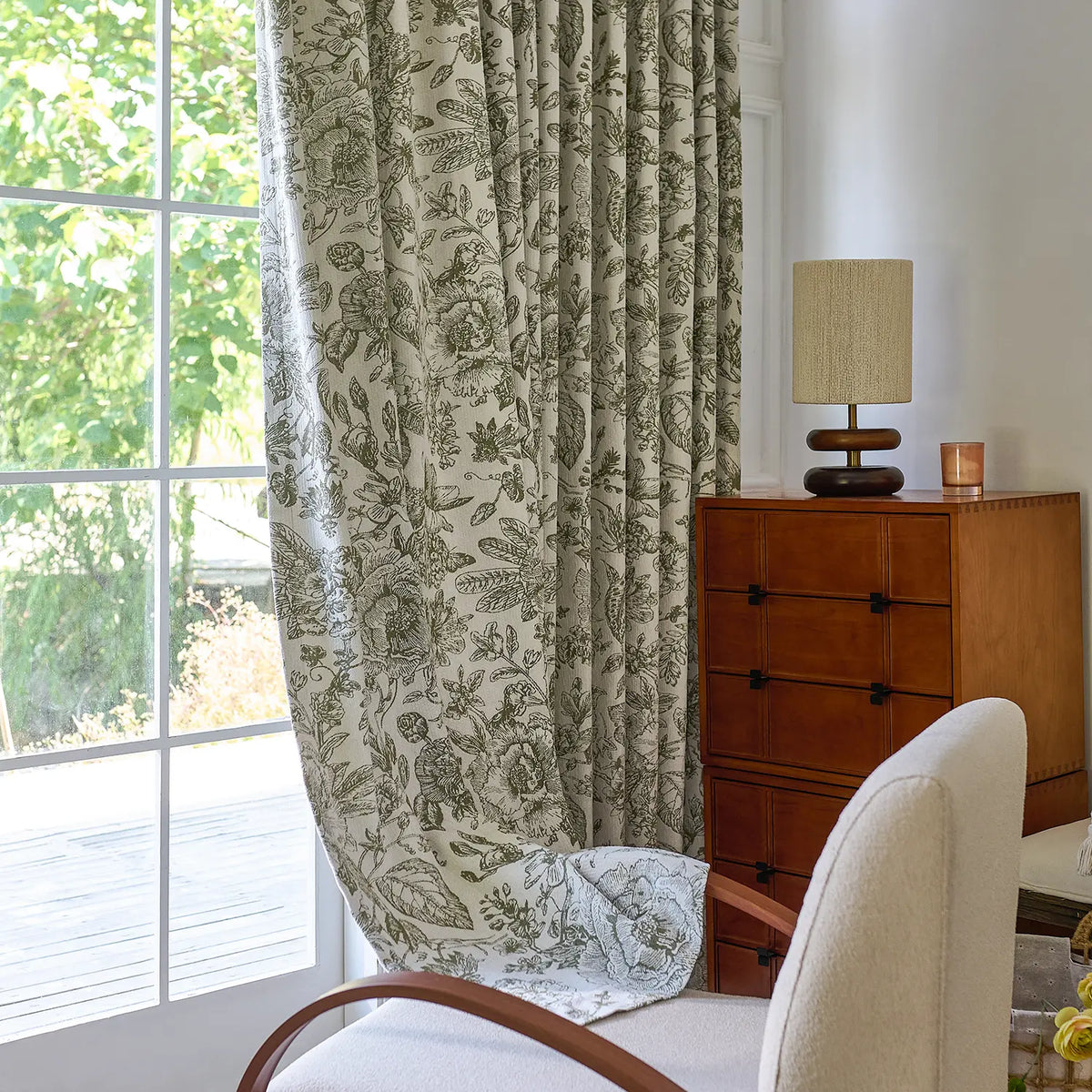 Cymbel H-002_scene_9 green vintage floral jacquard chenille blackout drapes, styled in a bright living room setting showcasing full window coverage and elegant home decor