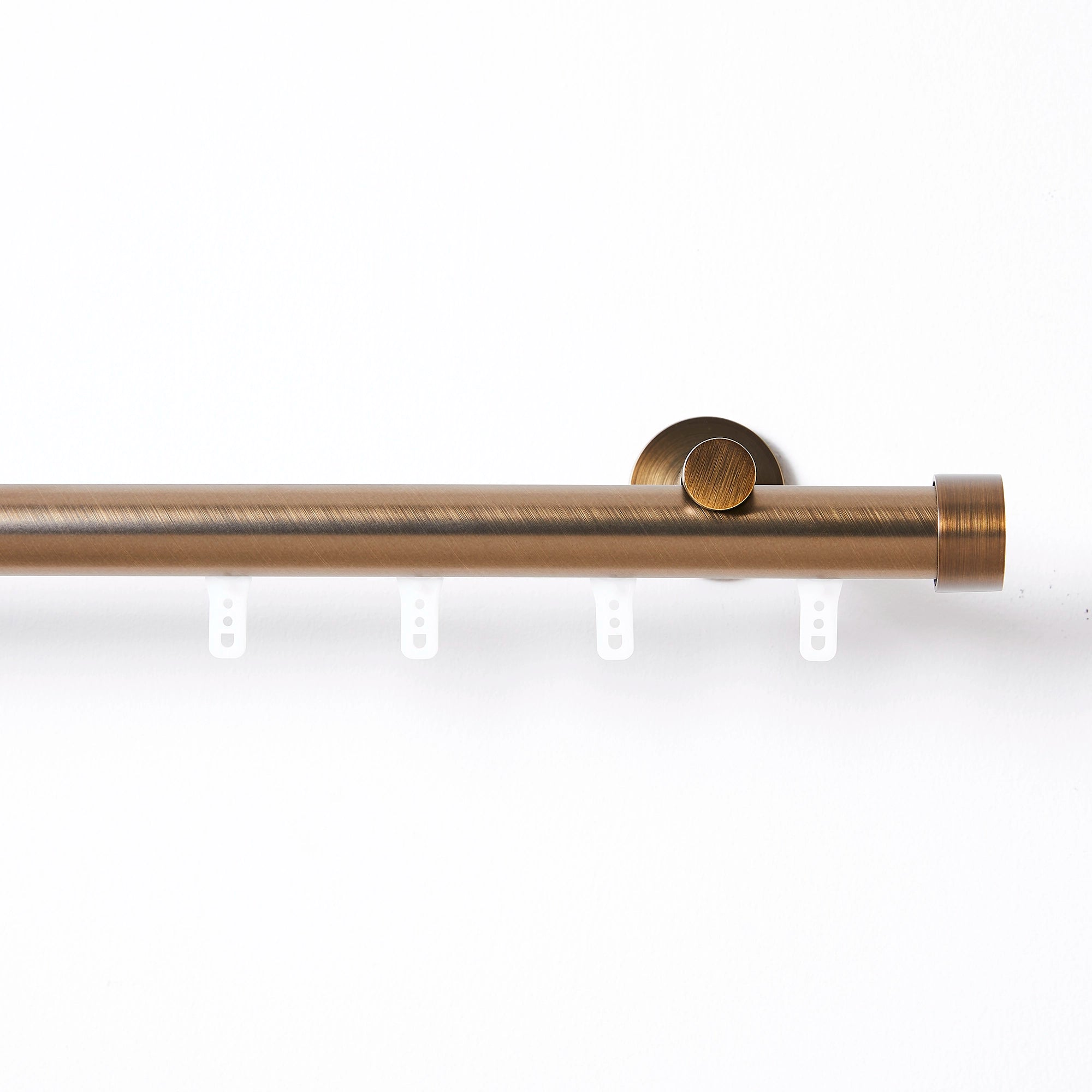 Darian Single Custom Traverse Curtain Rod Rod-2 in Antique Bronze finish showing traverse curtain rod with gliding pulley mechanism