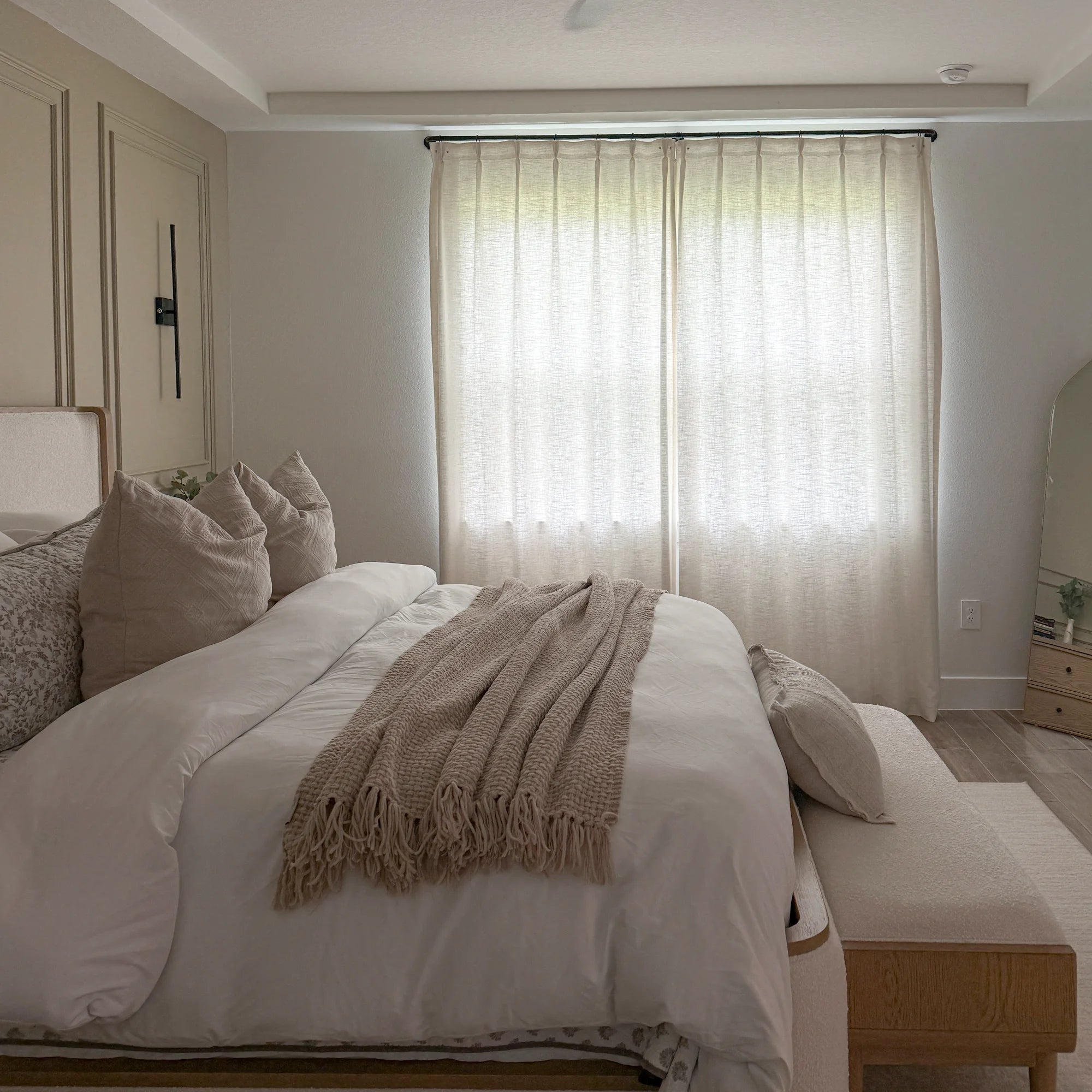 Elara linen curtains 89850-2-1, elegant drapes in a bedroom showcased to display the product's soft texture and graceful hanging effect