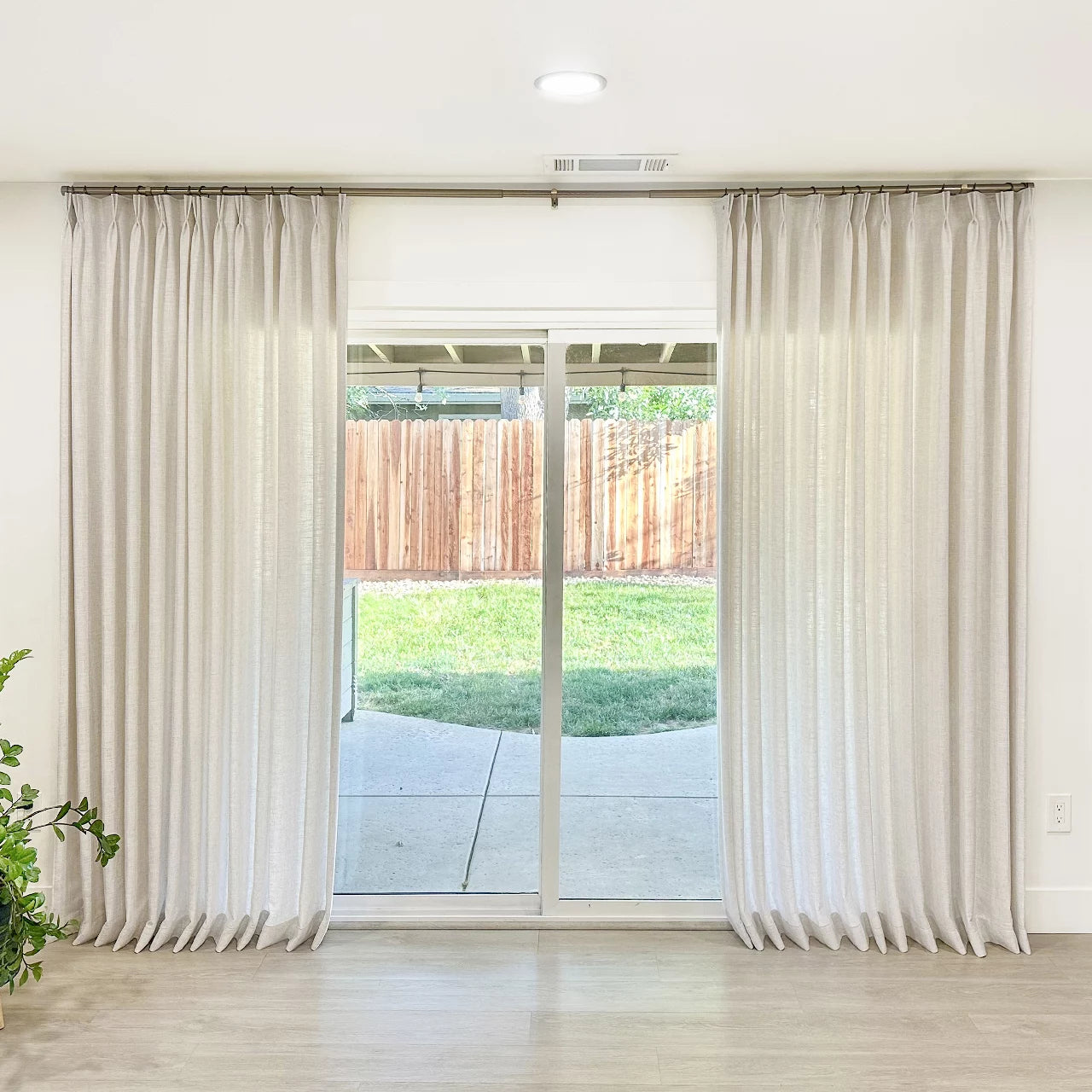 Elara linen semi sheer curtains 89850-1_inf_2 showcasing elegant drapes in spacious modern residential interiors