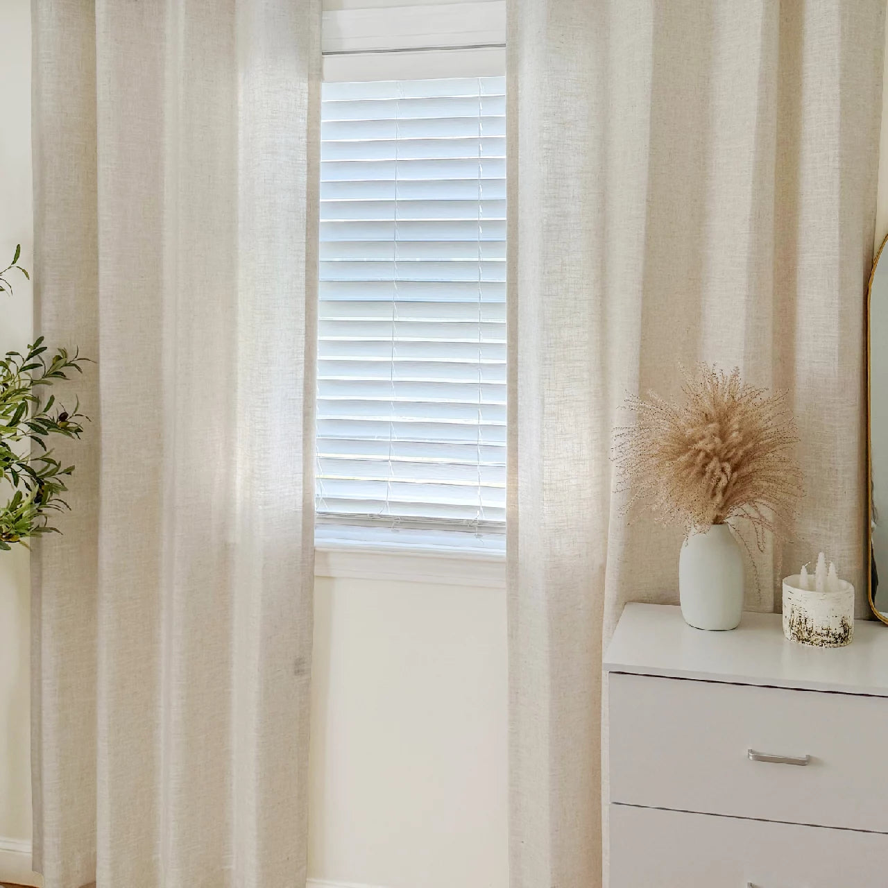 Elara linen curtains elegant drapes in a dining room showcased to display the product's soft texture and graceful hanging effect