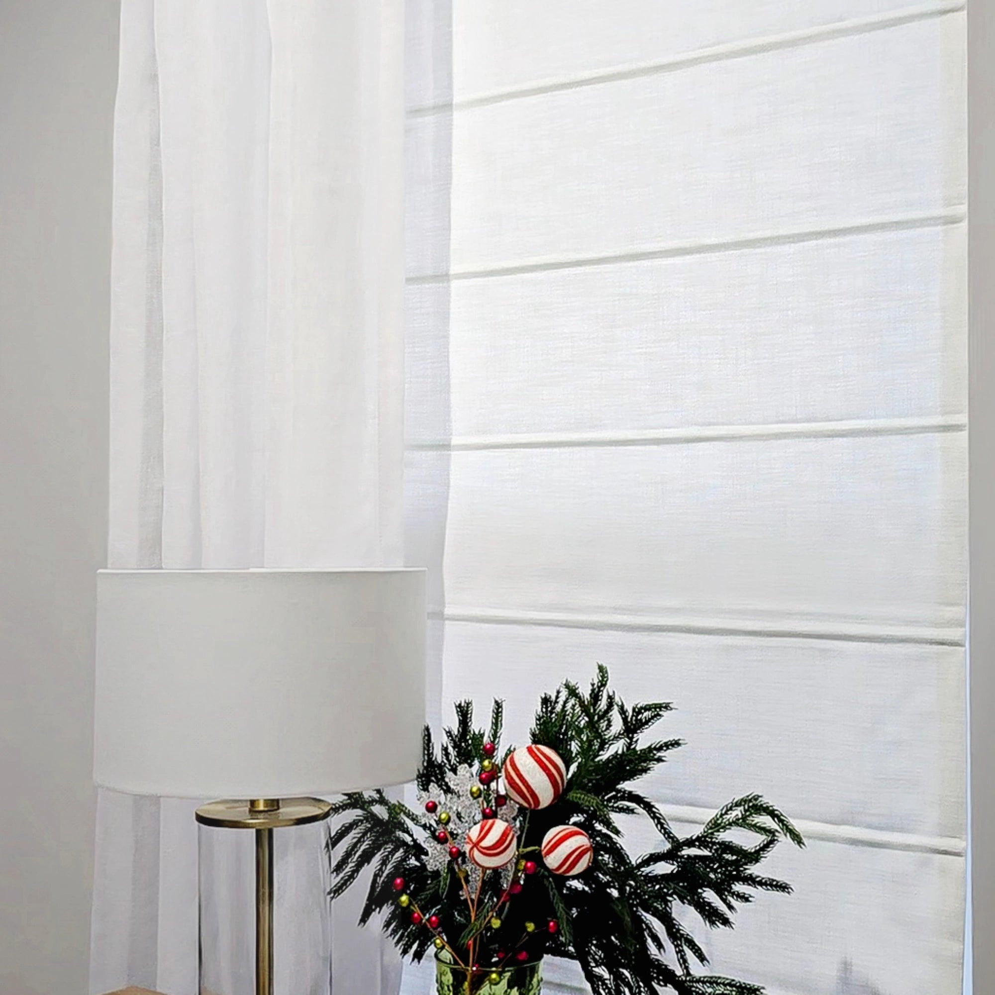 Elowen Heavyweight Textured Roman Shades: Image 7084-4-4 shows a full-room lifestyle scene, highlighting the shade’s heavy textured fabric, neat horizontal folds, soft light filtering effect, and elegant modern style that matches the interior perfectly.
