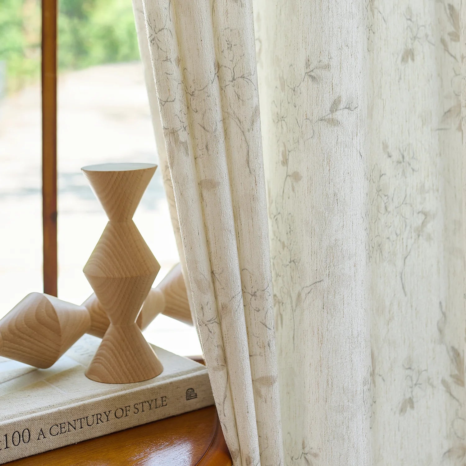 Elysia 800-5_scene_10 toile de Jouy linen textured floral sheer curtains, styled in a bright classic room showing soft light filtering and vintage pattern