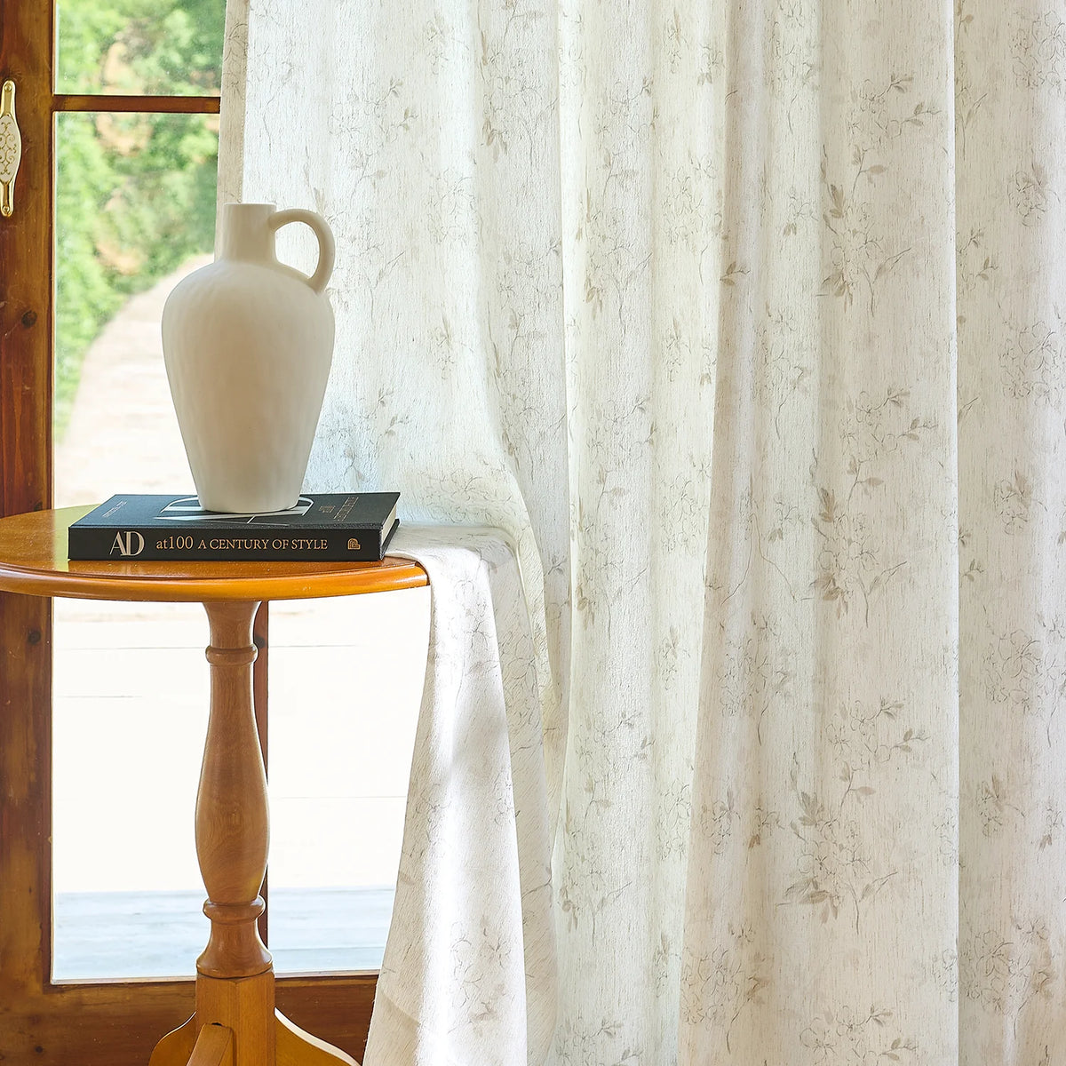 Elysia 800-5_scene_14 toile de Jouy linen textured floral sheer curtains, styled in a bright classic room showing soft light filtering and vintage pattern