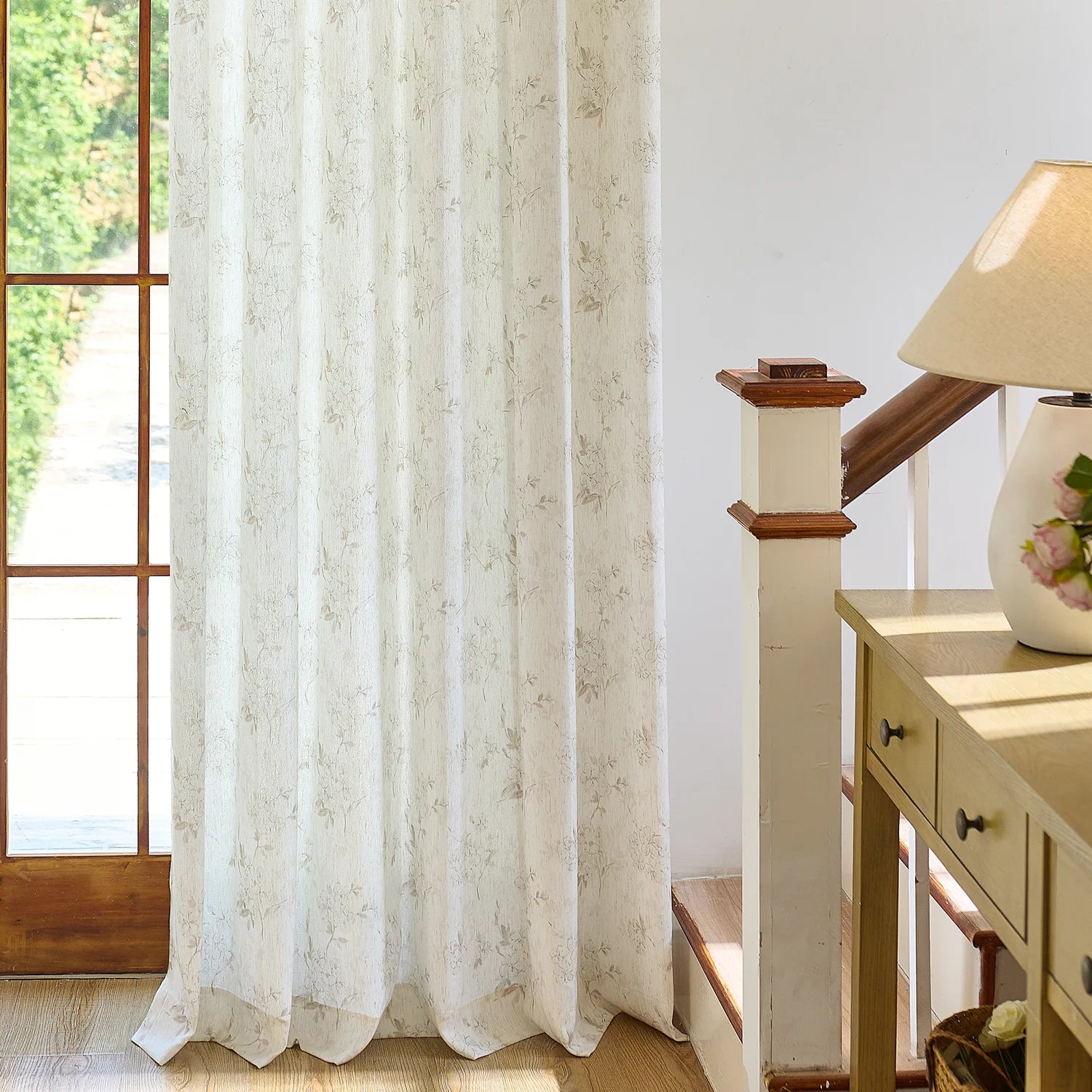 Elysia 800-5_scene_15 toile de Jouy linen textured floral sheer curtains, styled in a bright classic room showing soft light filtering and vintage pattern