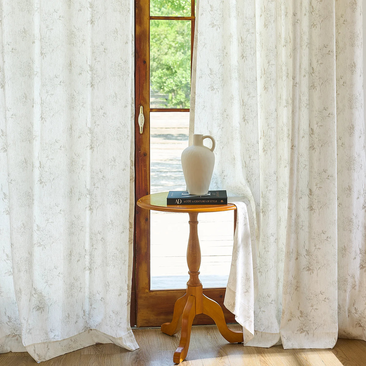Elysia 800-5_scene_6 toile de Jouy linen textured floral sheer curtains, styled in a bright classic room showing soft light filtering and vintage pattern