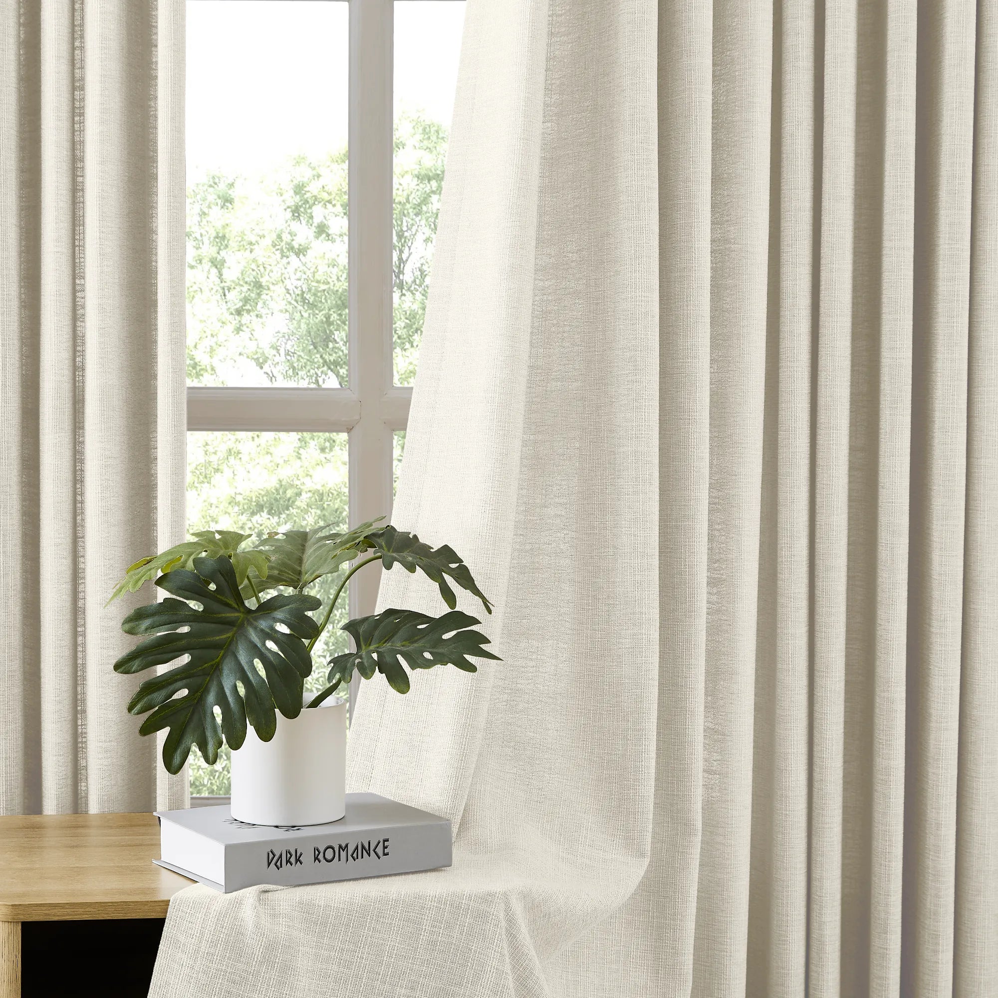 Transform your Living Room with Fiora Cotton Curtains, providing a perfect balance of style and function.