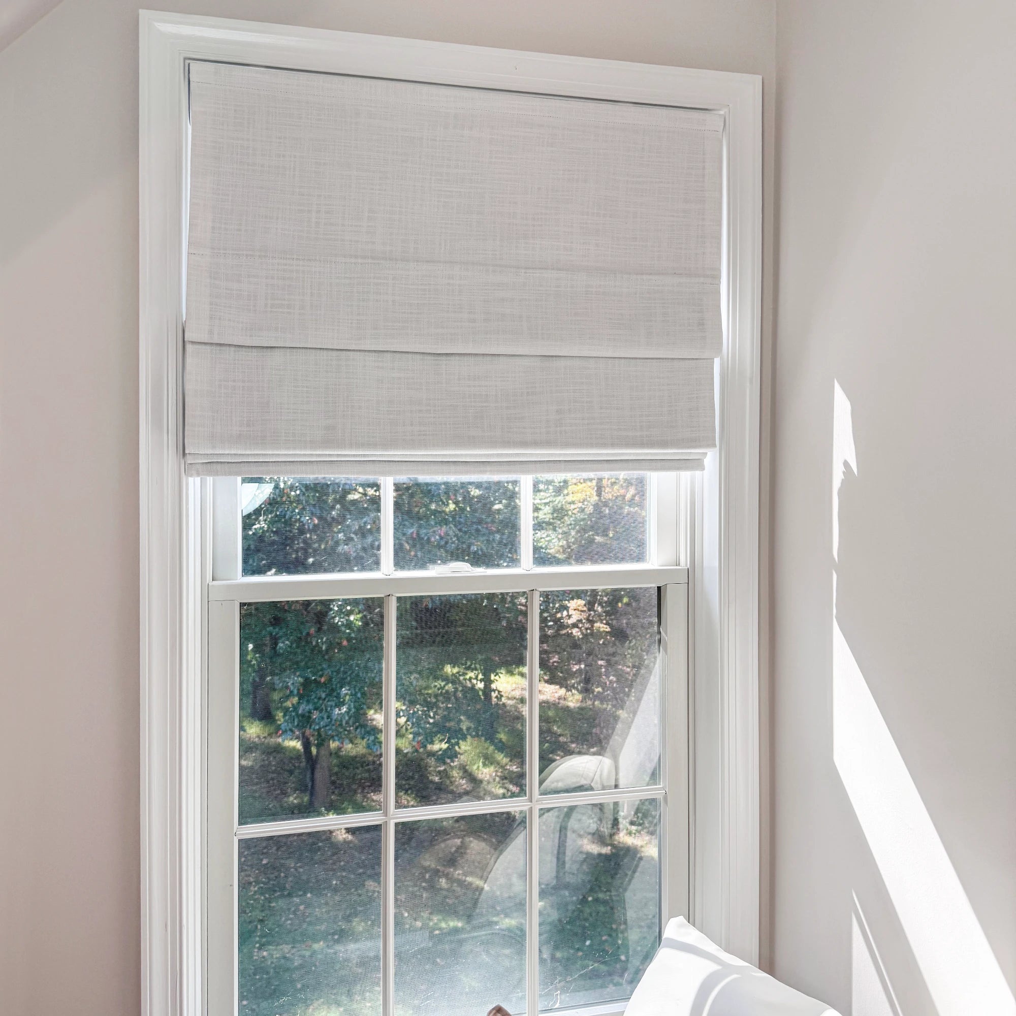 Elara White Roman Shades: Image 89850-0-1 shows the white linen-blend shade with soft texture and neat folds.