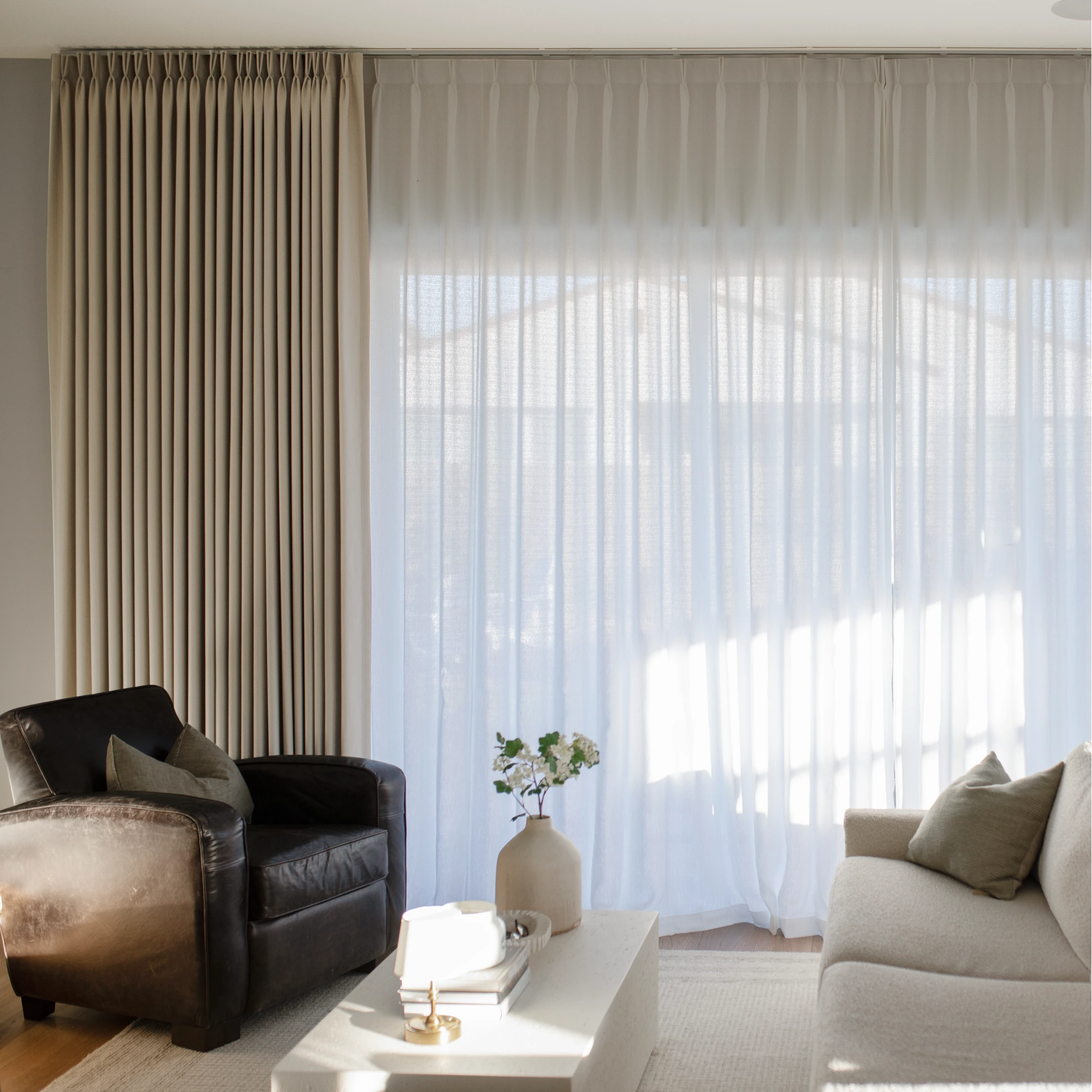Ilythra cotton curtains in a living room scene view 2 highlighting soft drape and light filtering for a cozy interior setting