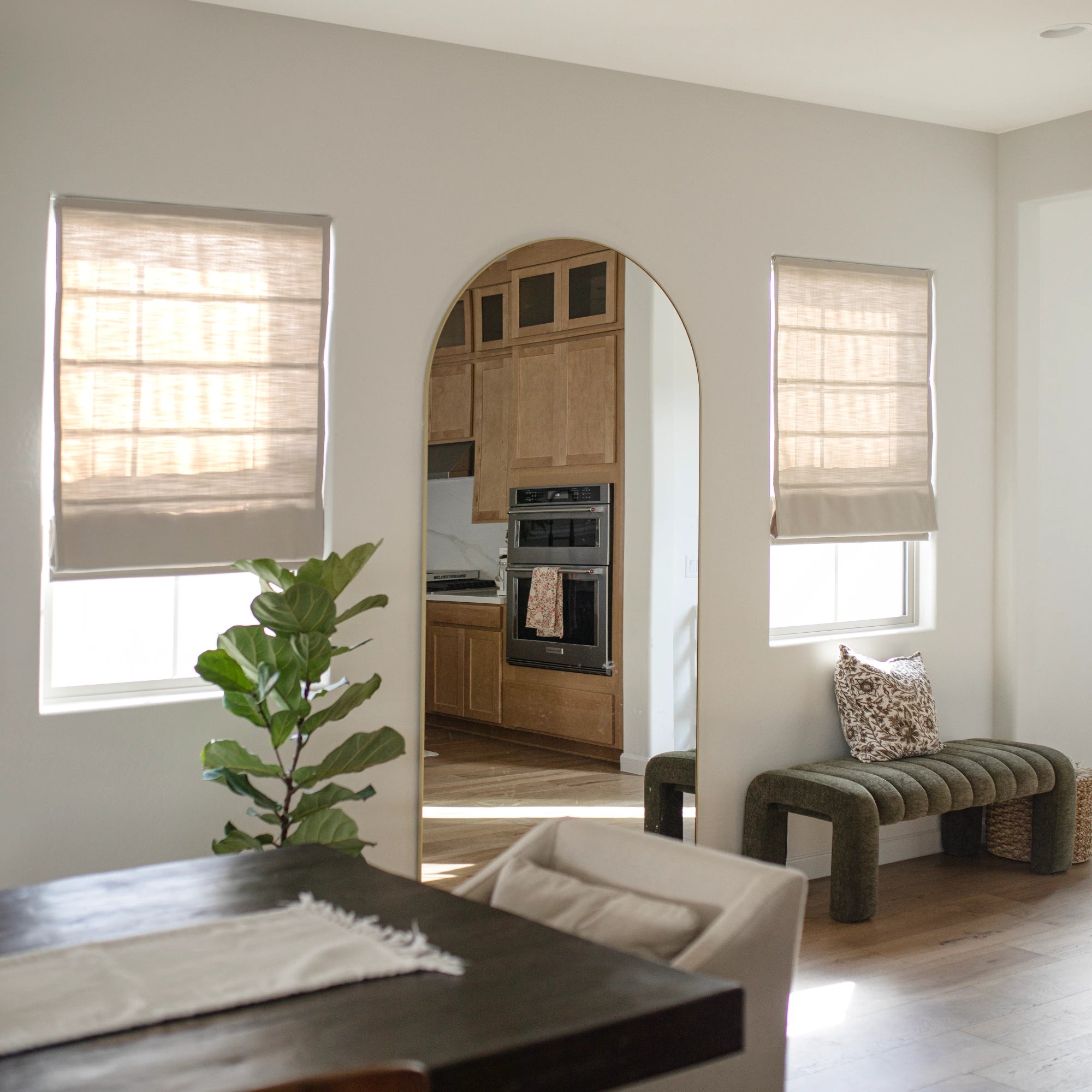 Ilythra cotton linen roman shades in a modern living room setting view 5