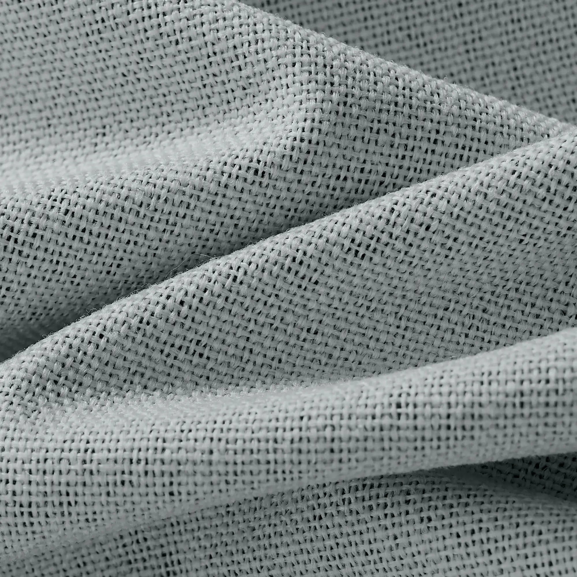 Isadora OY6-238-10 detail 1 100% blackout curtains showing fabric texture and light blocking effect