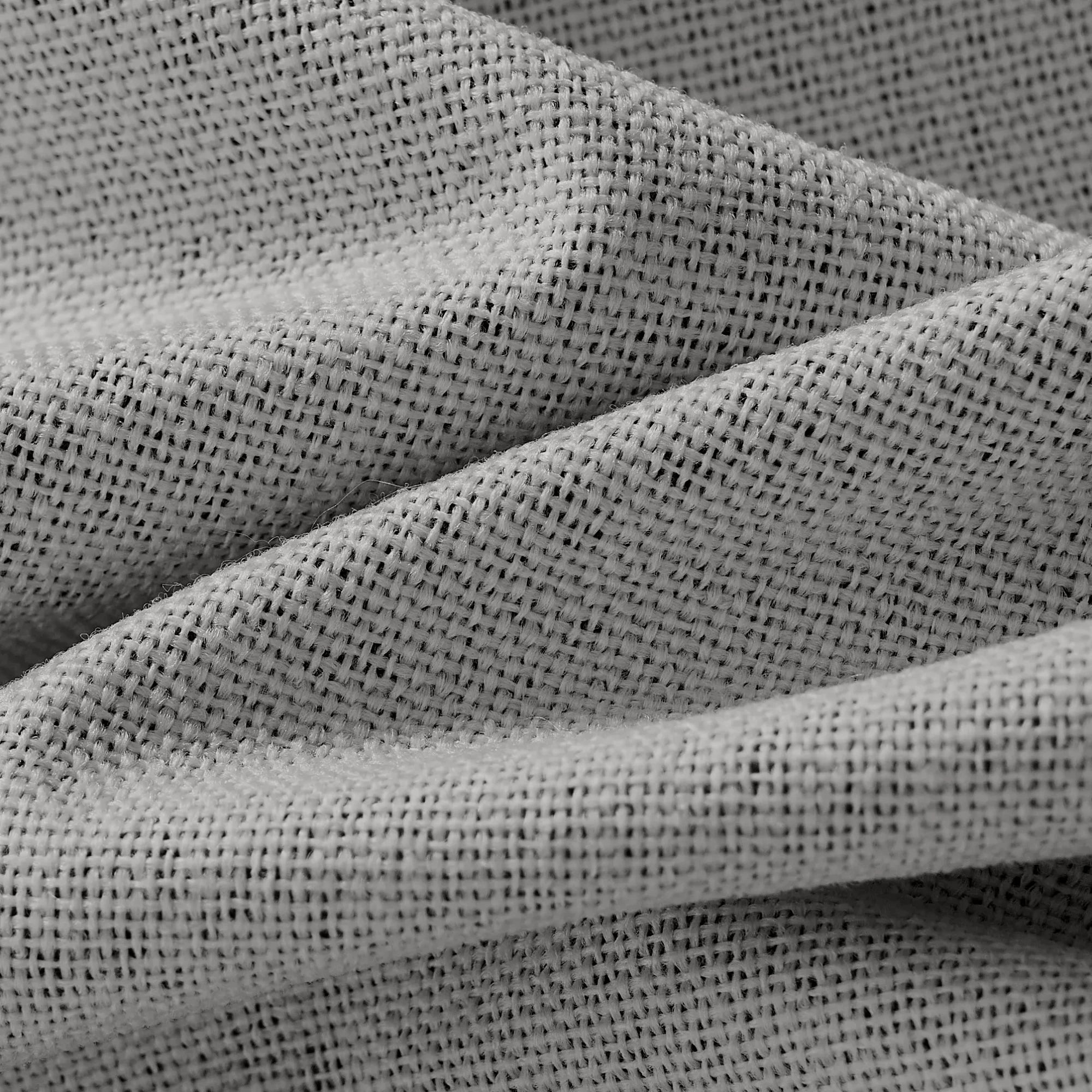 Isadora OY6-238-1 detail 1 100% blackout curtains showing fabric texture and light blocking effect