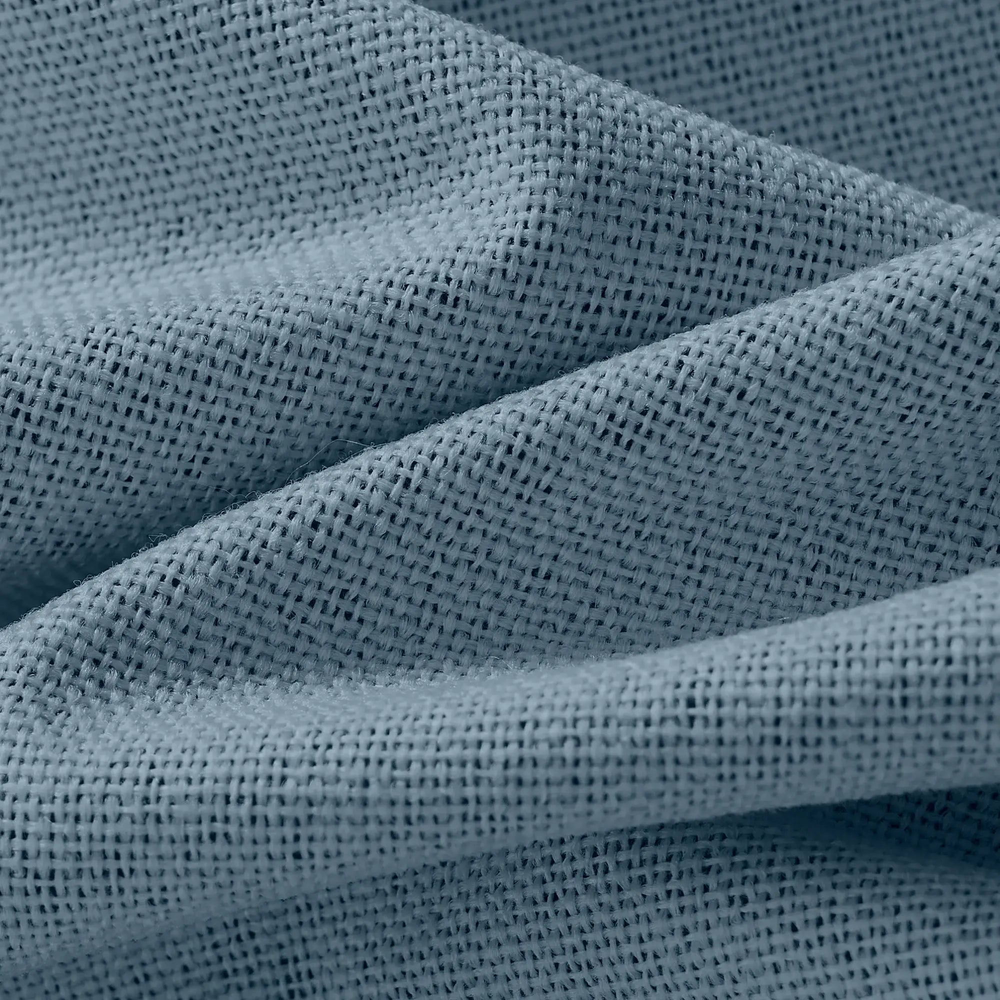 Isadora OY6-238-21 detail 2 100% blackout curtains highlighting fabric texture and light blocking performance