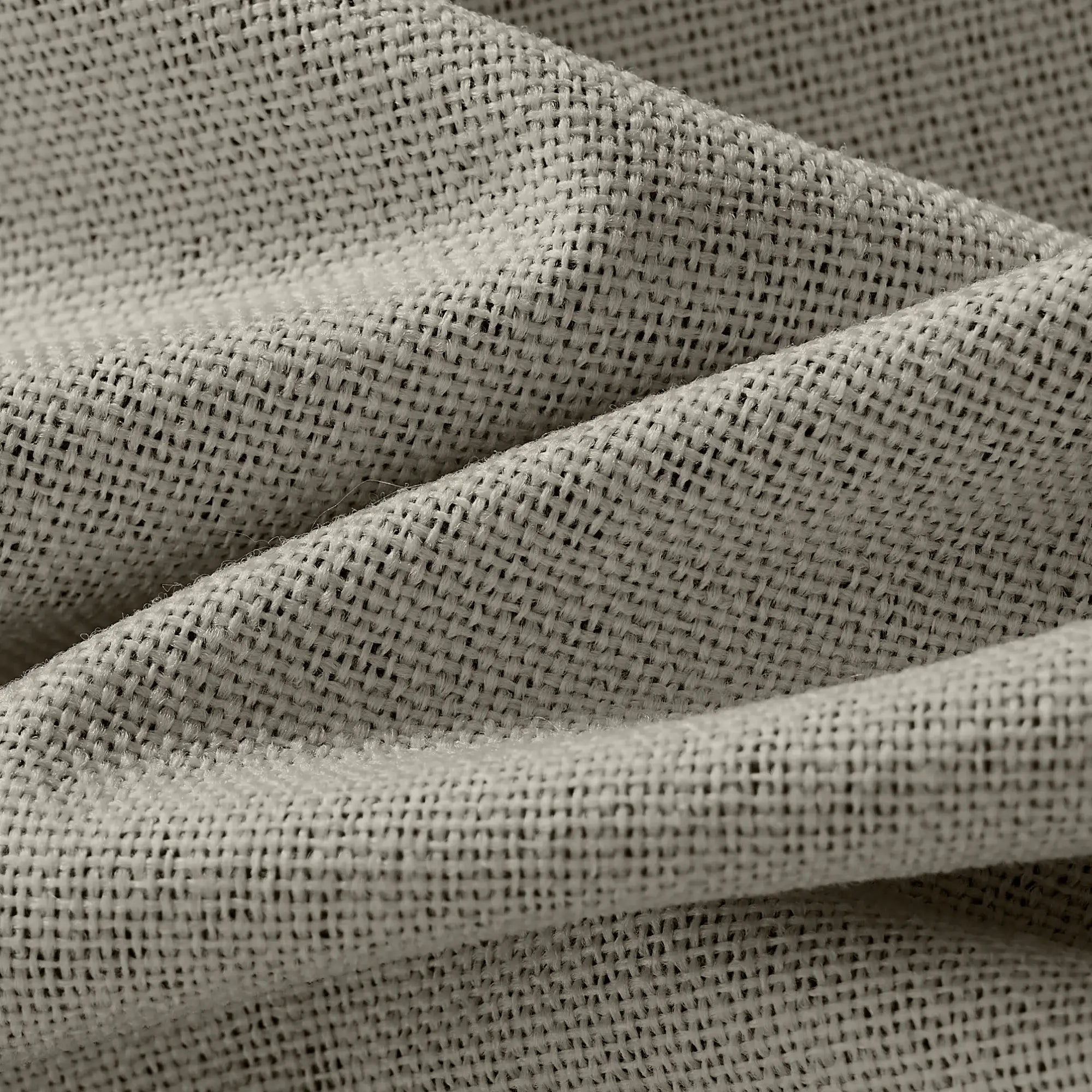 Isadora OY6-238-4 detail 1 100% blackout curtains showing fabric texture and light blocking effect