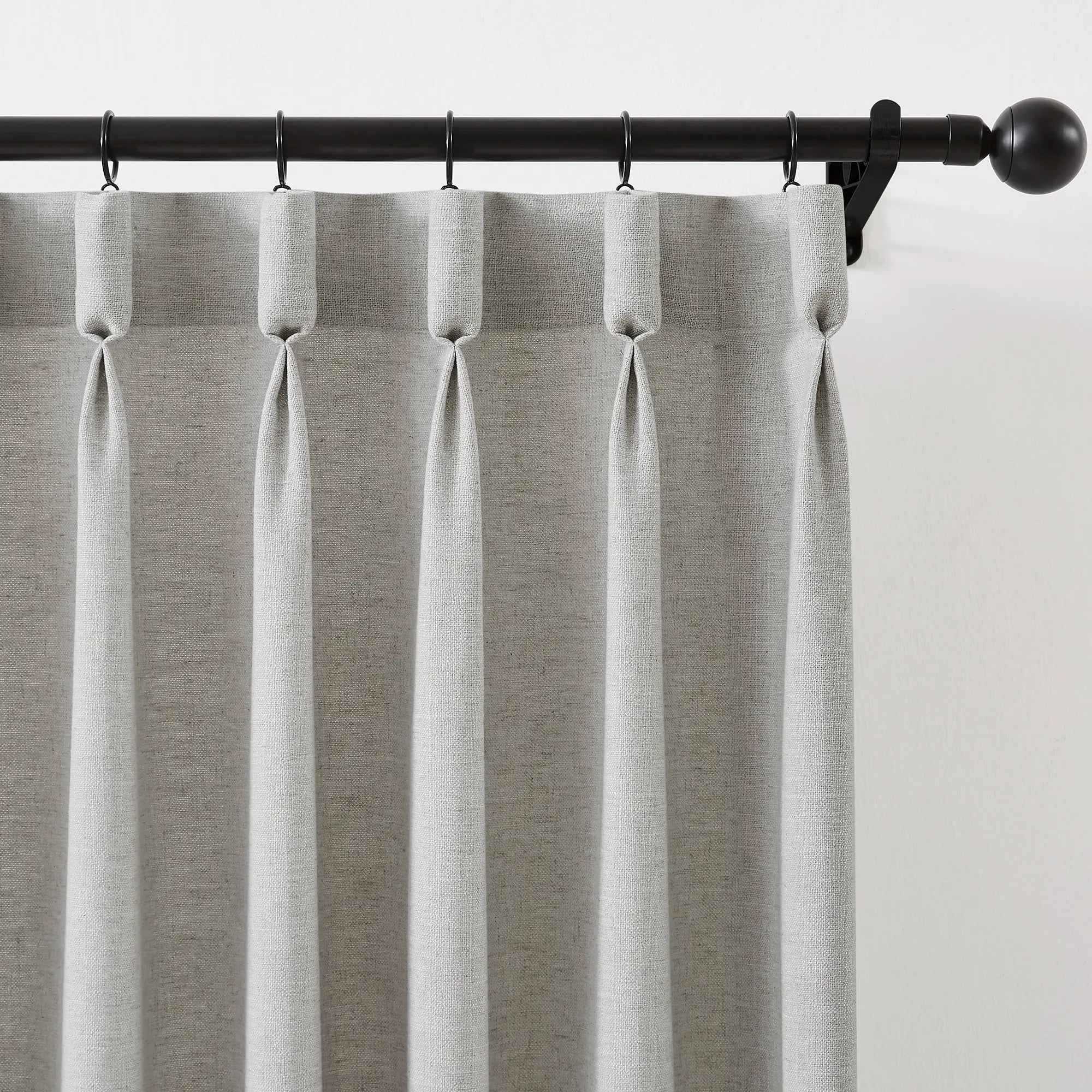 Jovienne linen cotton blend curtain, soft with modern draping, hook details displayed