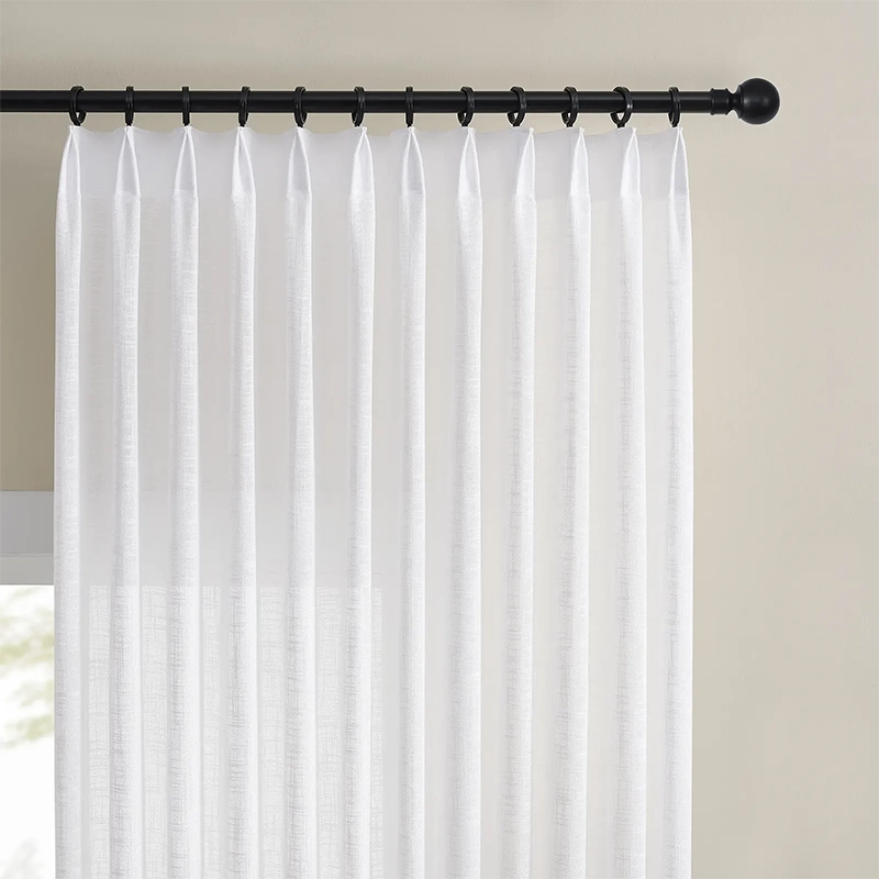 Custom-sized semi-sheer drapes with pleated design details