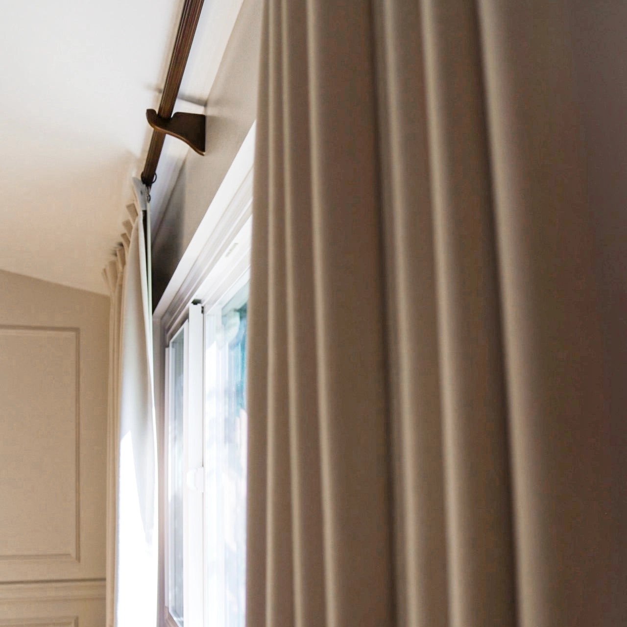 Lyra Velvet-Like Texture Blackout Curtains cloud-1-4 highlighting the smooth luxurious drape and ideal room darkening effect in a contemporary home setting