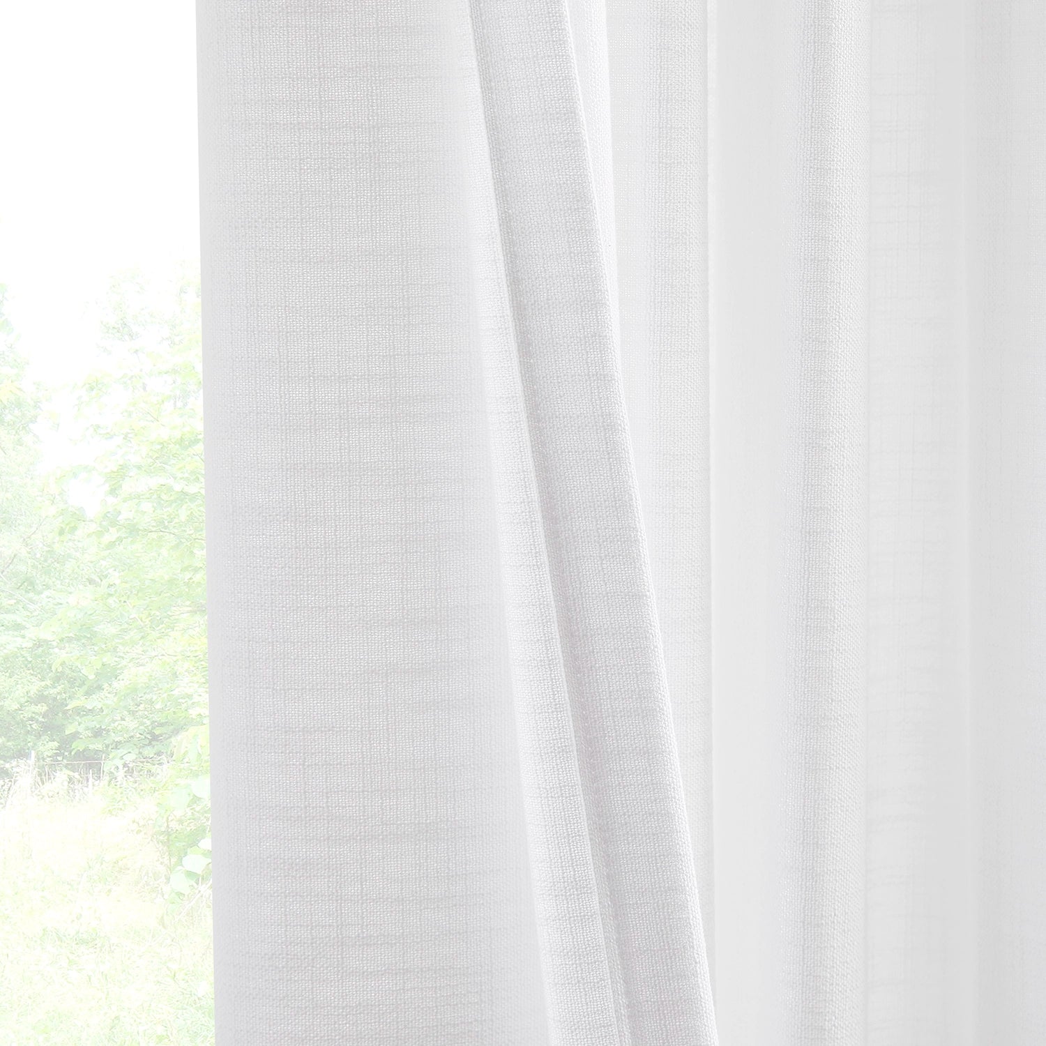 Marisol Linen Curtains adding a touch of sophistication to your living room, perfect for natural light, front and back detail display