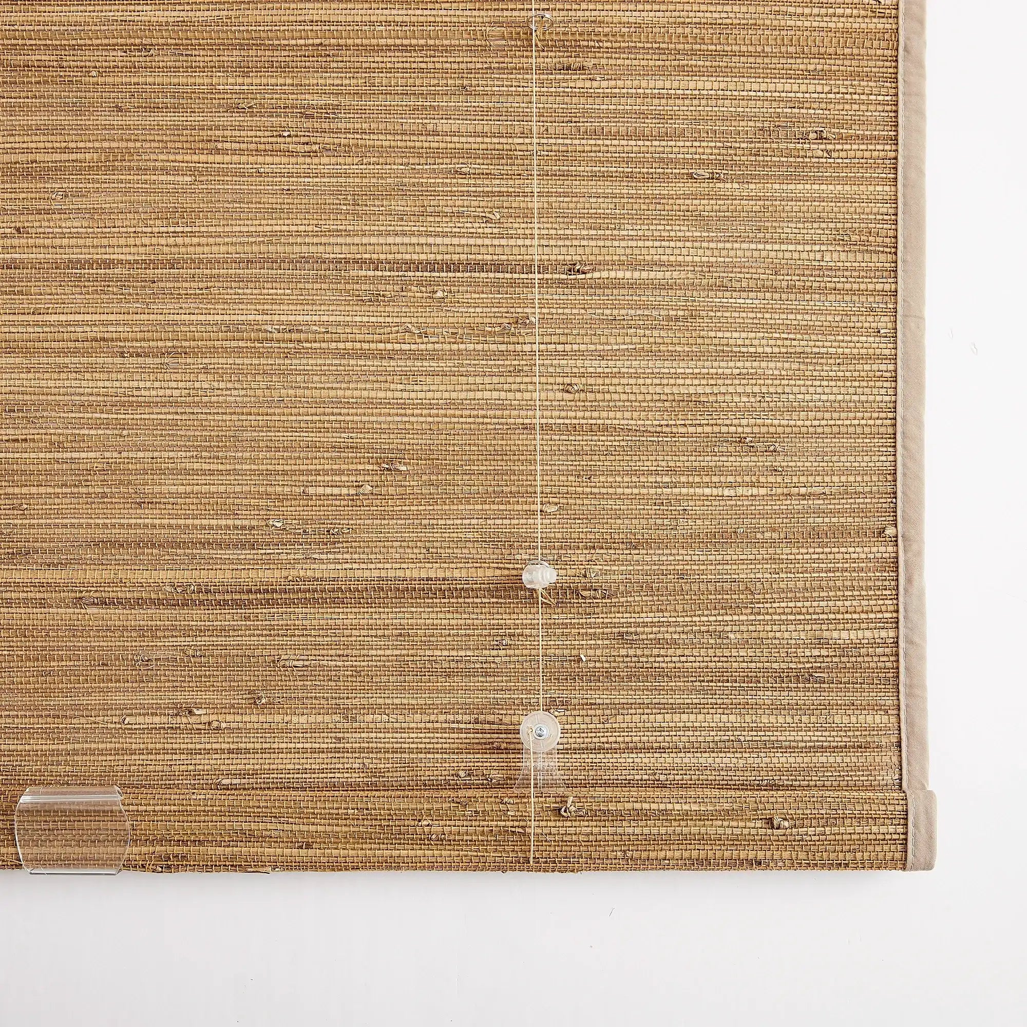 Noris No-Drill bamboo & jute woven shades, creates warm and natural visual effect