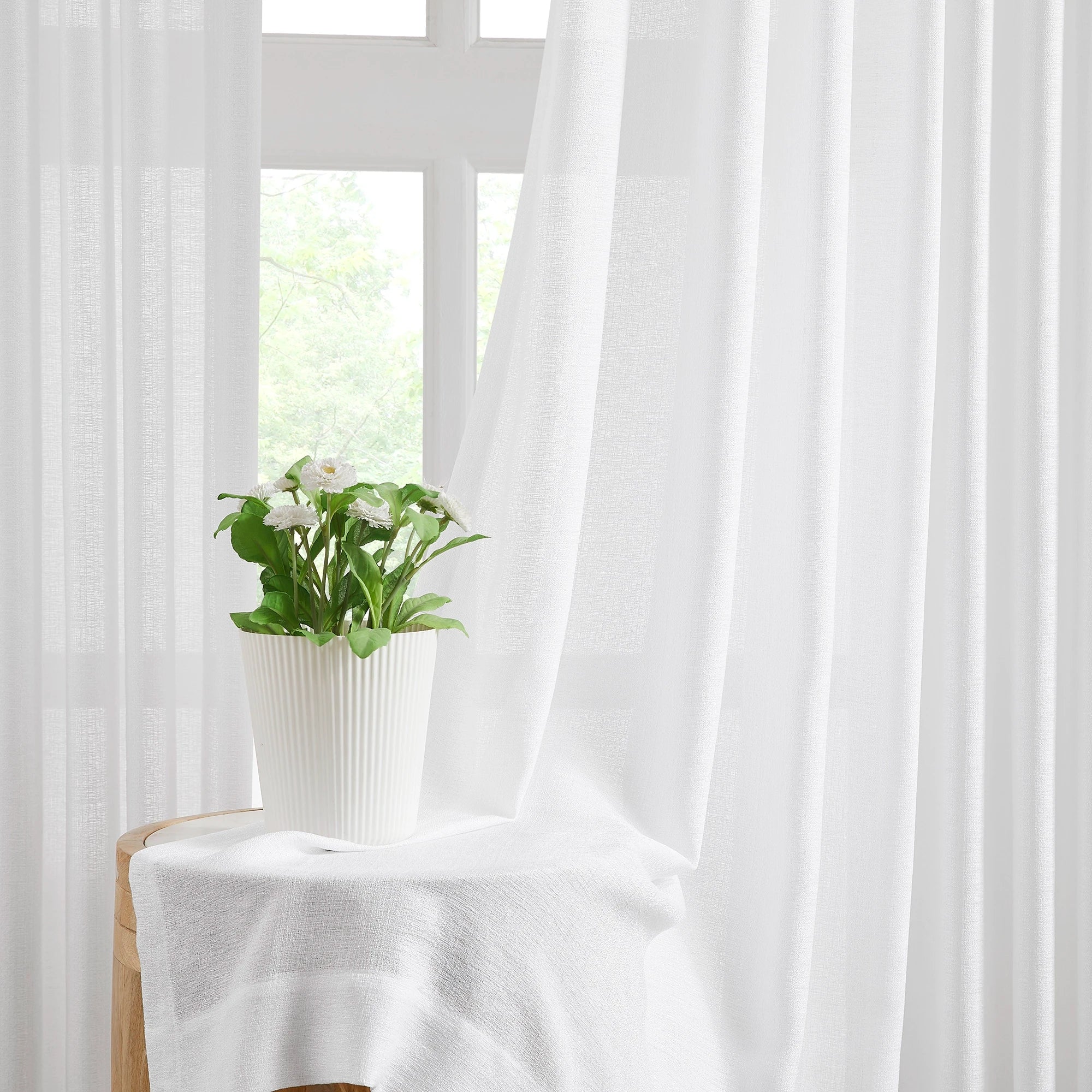 Nova 1 scene 4 semi-sheer elegant drapes for large windows showcasing the curtains in a home interior