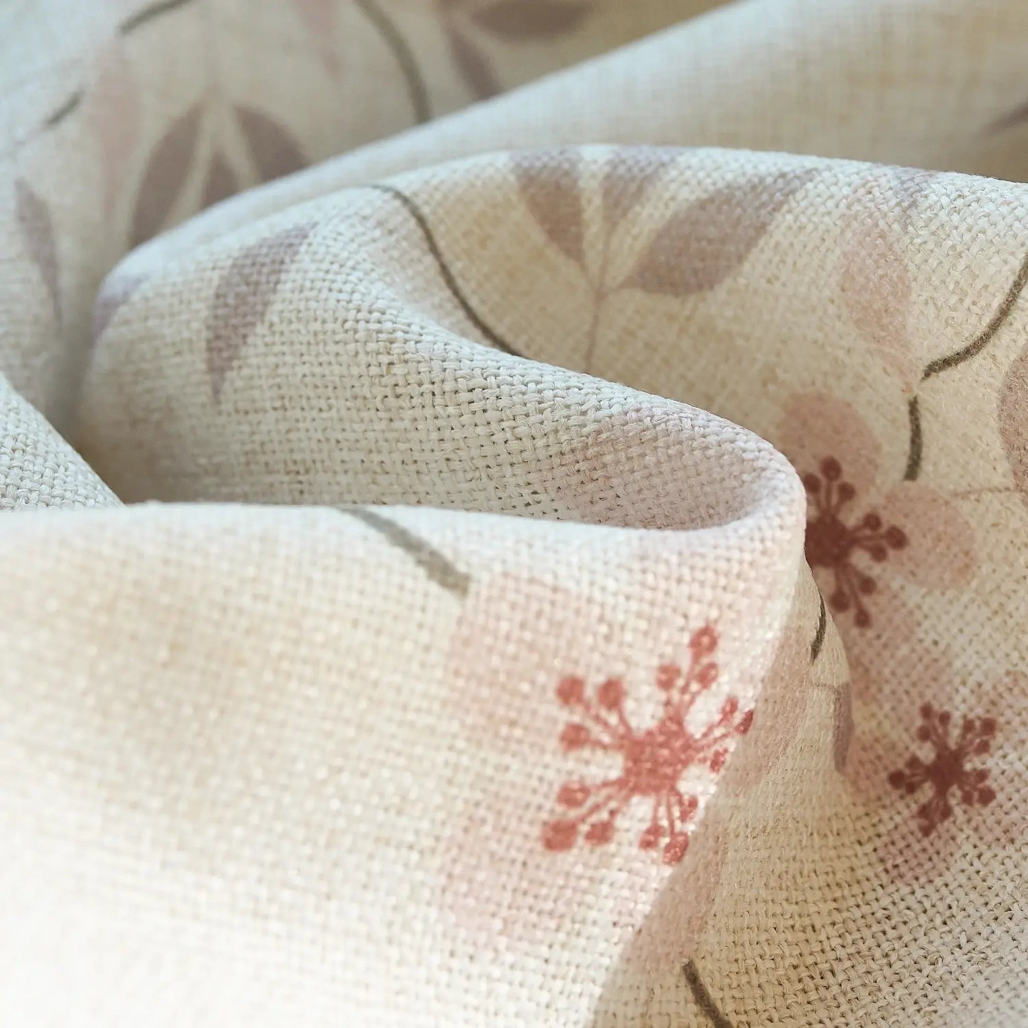 Olivine Peach Blossoms Linen Textured Roman Shades: Image H-005_detail_4 highlights the delicate peach blossom print details, natural linen textured fabric and exquisite craftsmanship of the roman shade.
