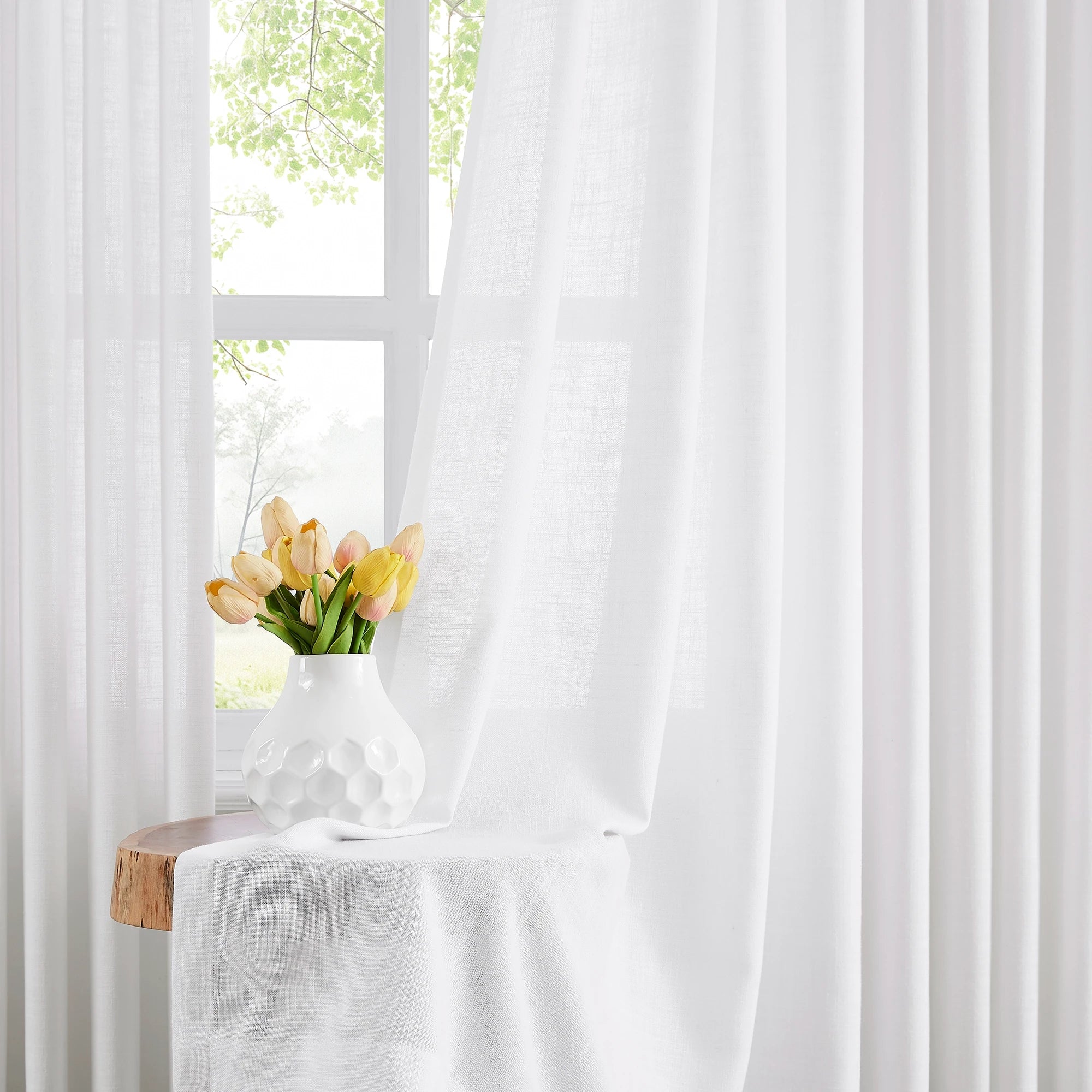 Orinda Semi Sheer Curtains adding a touch of sophistication to your living room, perfect for natural light.