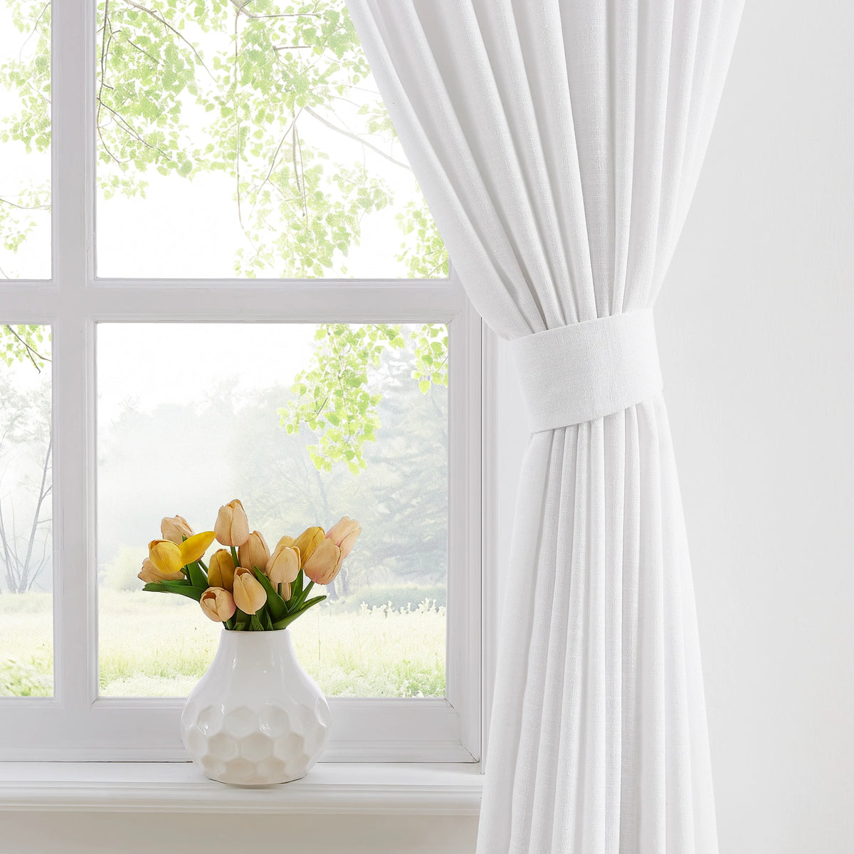 Orinda semi sheer elegant drapes for large windows KLQ2-2 scene 4 presenting the soft texture and elegant hanging drape of the curtains in a bright interior space