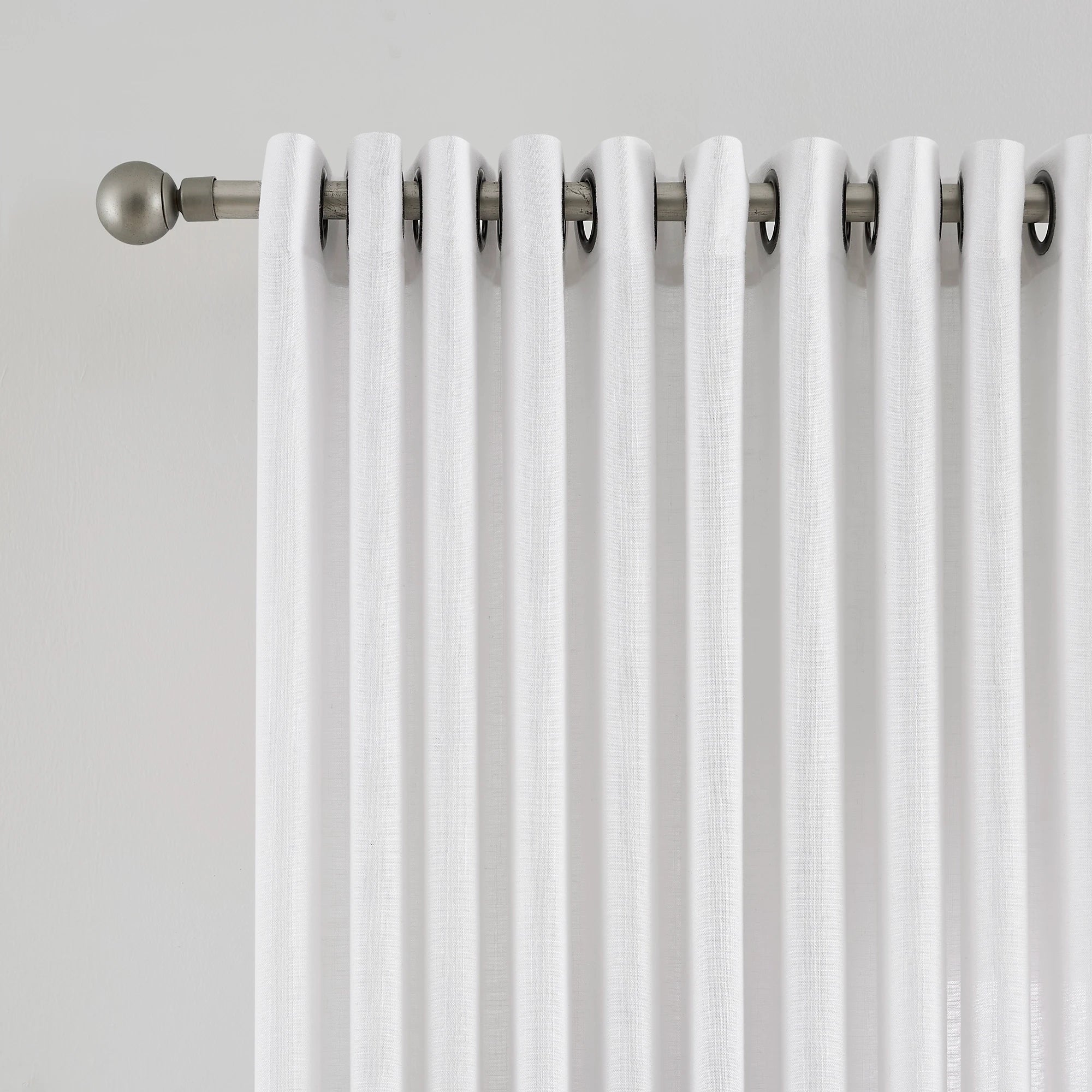 Orinda Semi Sheer Curtains adding a touch of sophistication to your living room, perfect for natural light.