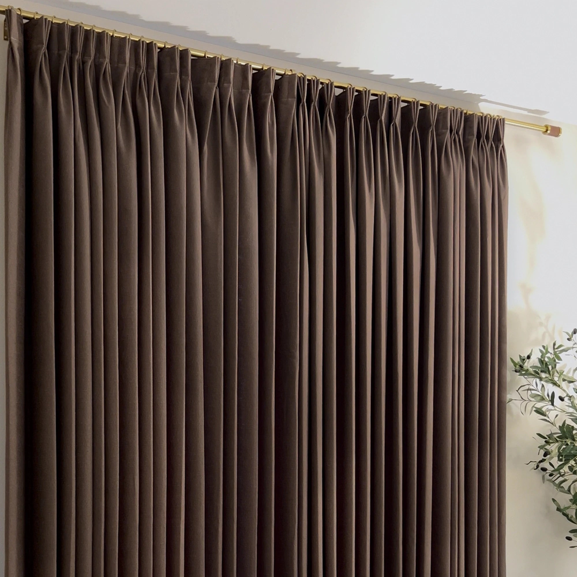 Seraphine linen texture curtains showing light filtering feature and soft drapery texture