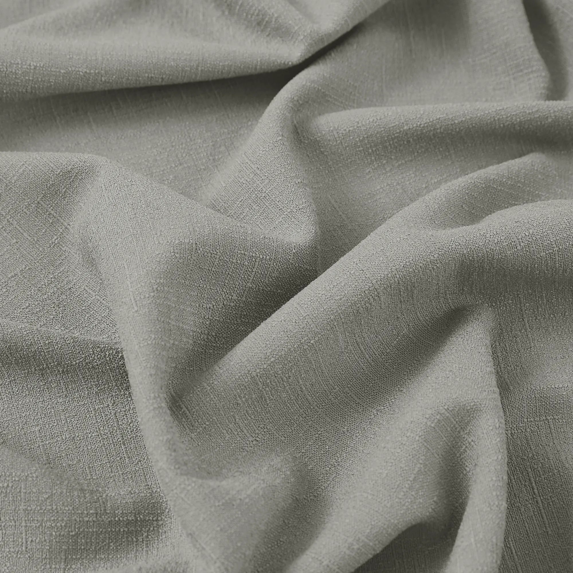Seraphine linen texture curtains detail showing light filtering feature and soft drapery texture