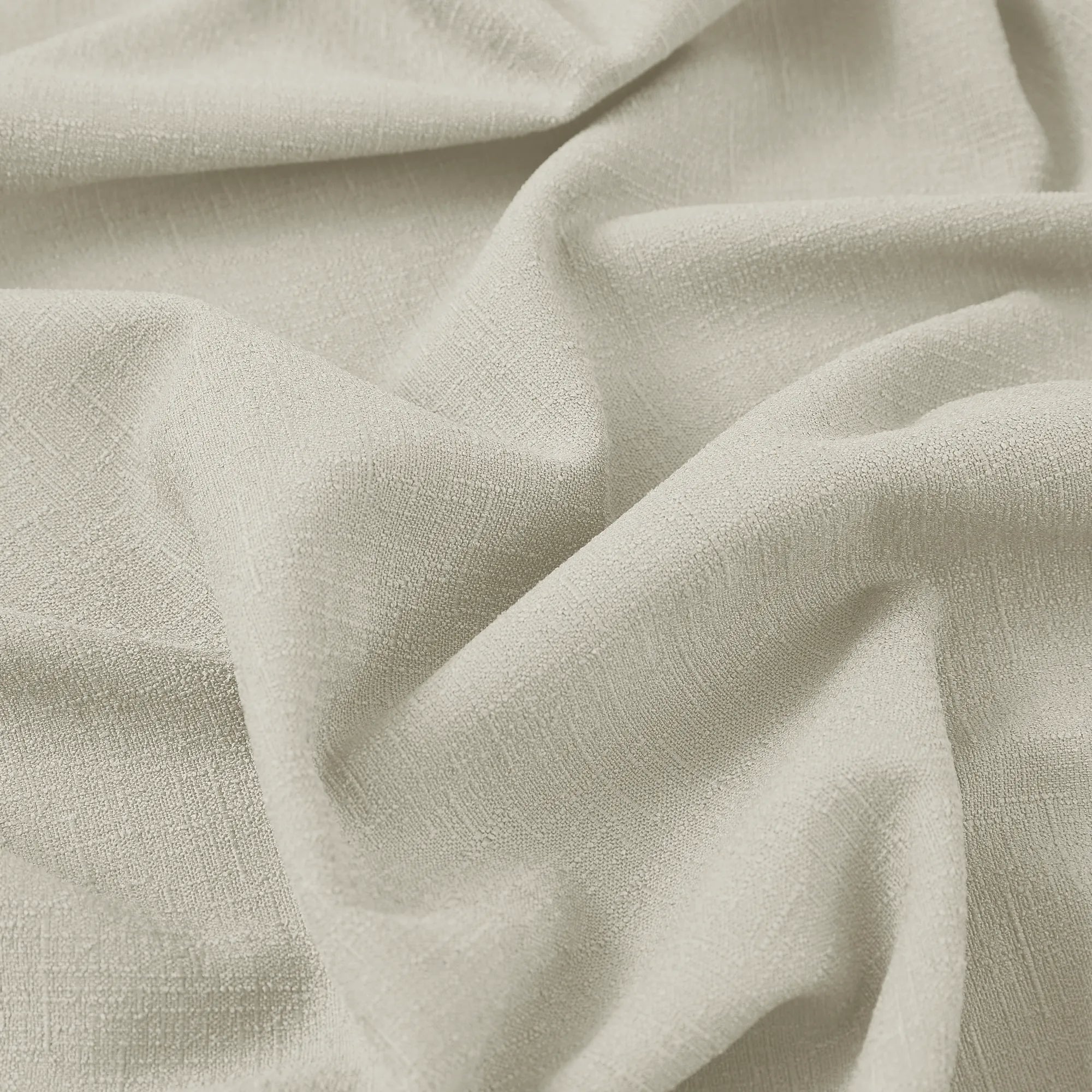 Seraphine linen texture curtains detail_2 showing light filtering feature and soft drapery texture
