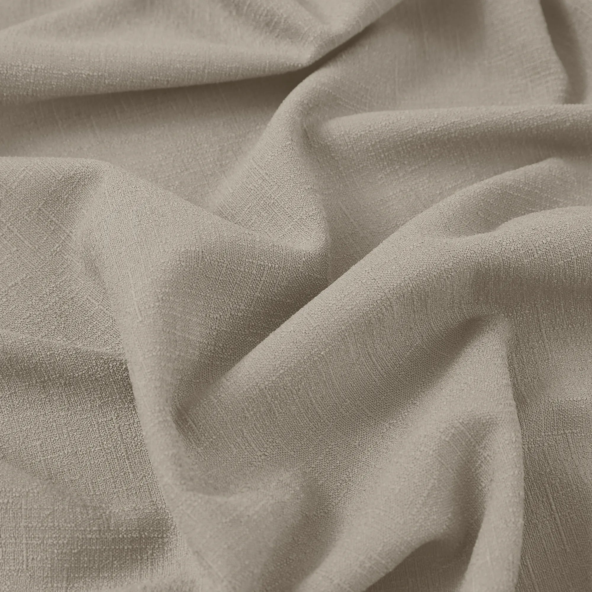 Seraphine linen texture curtains detail showing light filtering feature and soft drapery texture