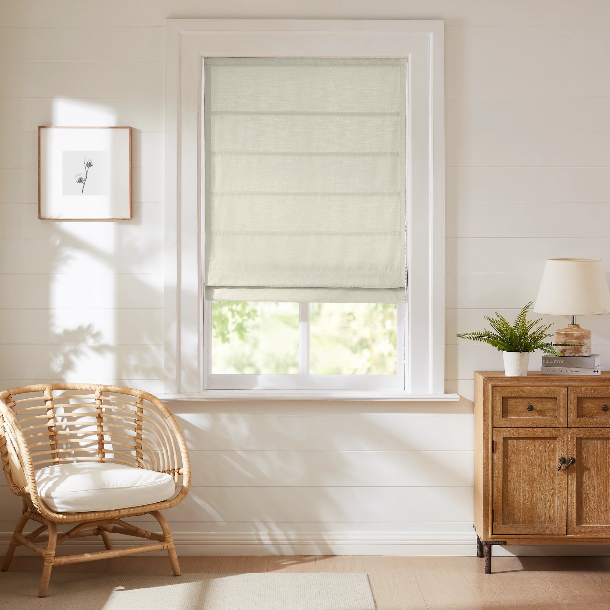 Seraphine Linen Texture Roman Shade: Image 9013-2_scene_1 featuring a linen-textured roman shade with neat tailored folds and natural woven texture in a bright modern home interior