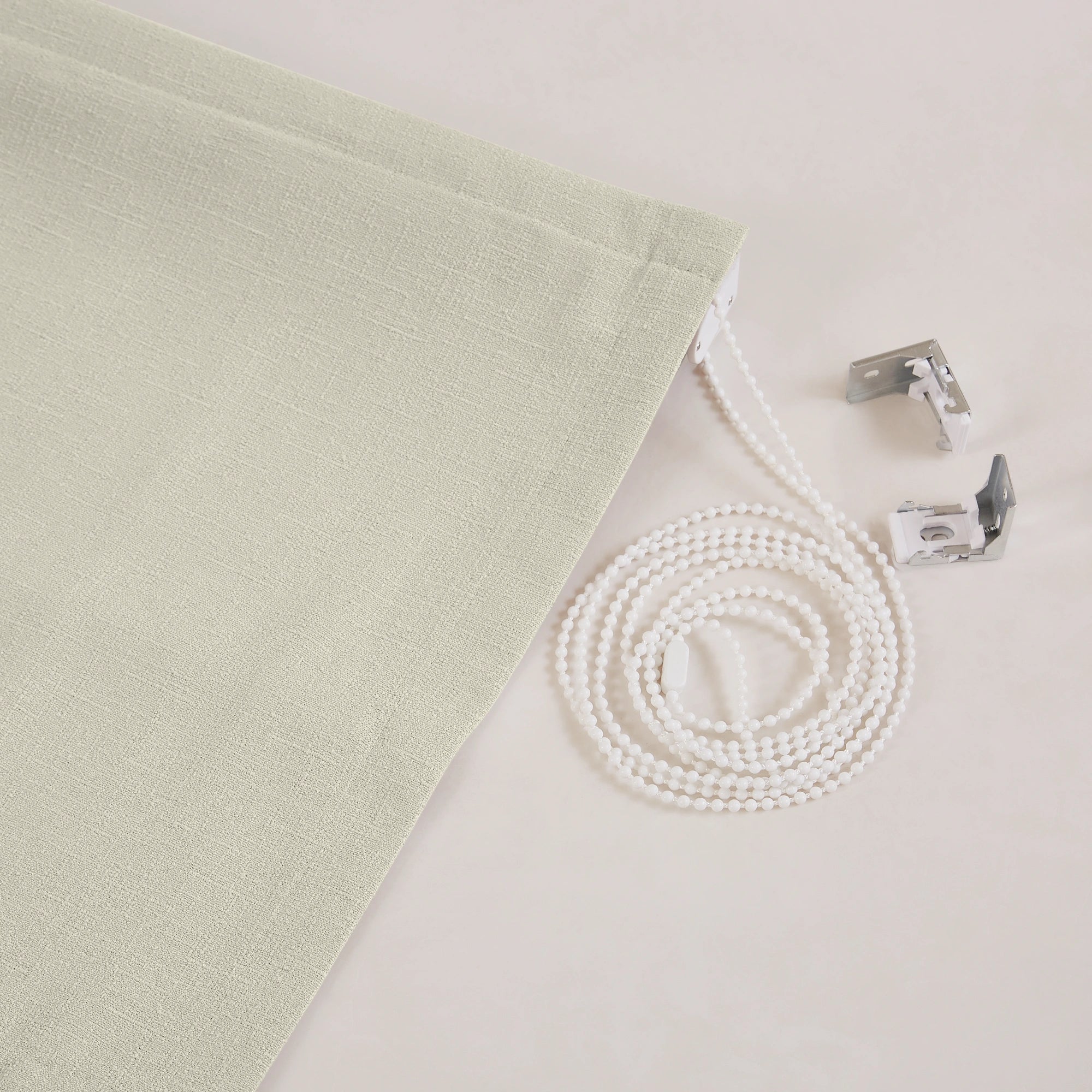 Seraphine Linen Texture Roman Shade: Image 9013-2_scene_4 highlighting premium linen-textured roman shade with crisp tailored folds, natural woven texture, and timeless neutral styling in a bright contemporary interior