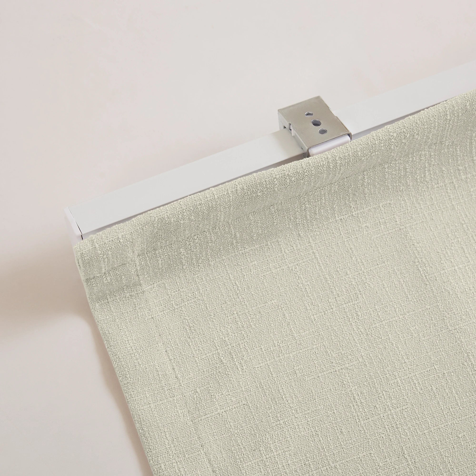 Seraphine Linen Texture Roman Shade: Image 9013-2_scene_5 featuring a premium linen-textured roman shade with neat tailored folds, natural woven fabric texture, and elegant window styling in a bright modern home interior