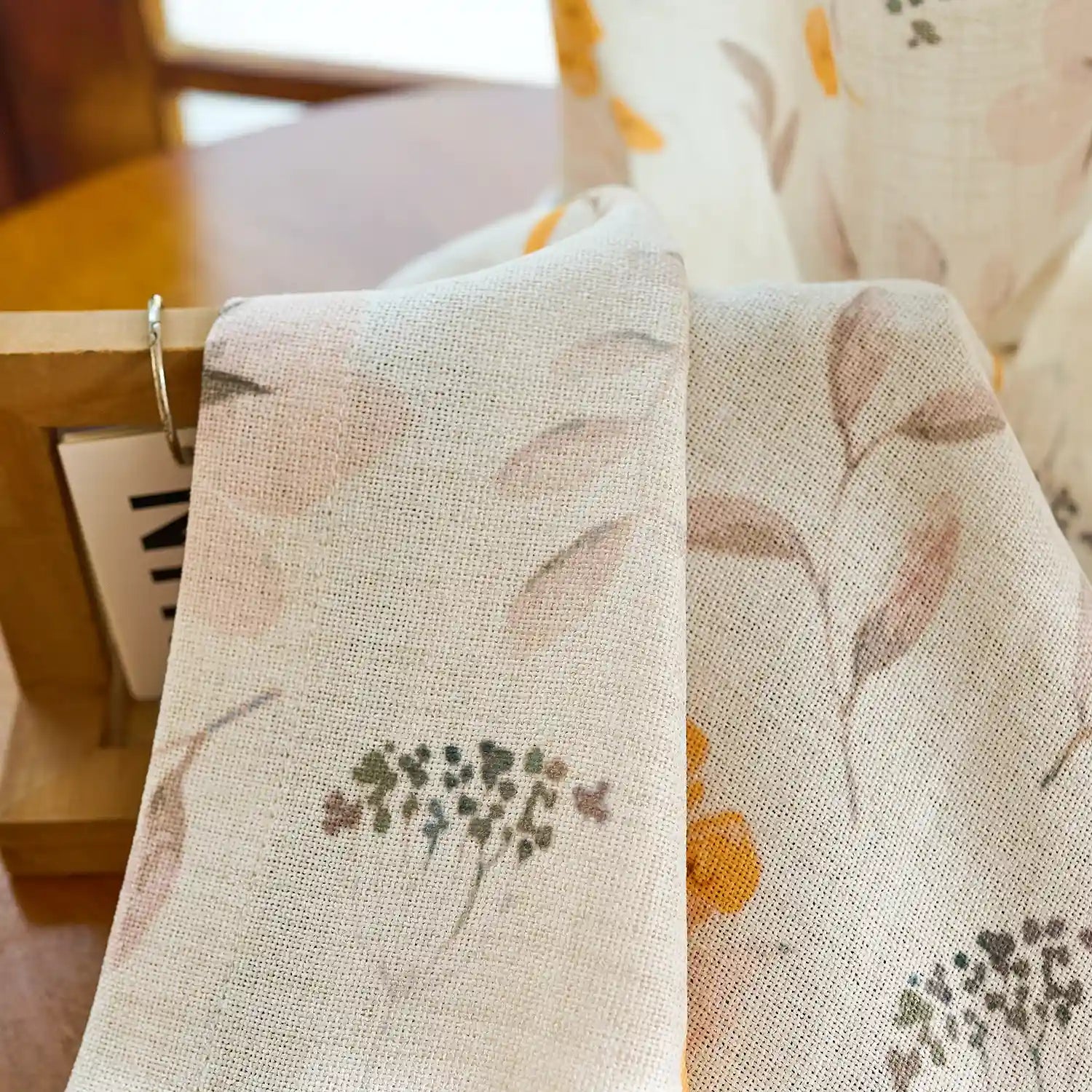 Sylviana H-004_detail_1 yellow wildflowers linen textured sheer curtains showing delicate floral print