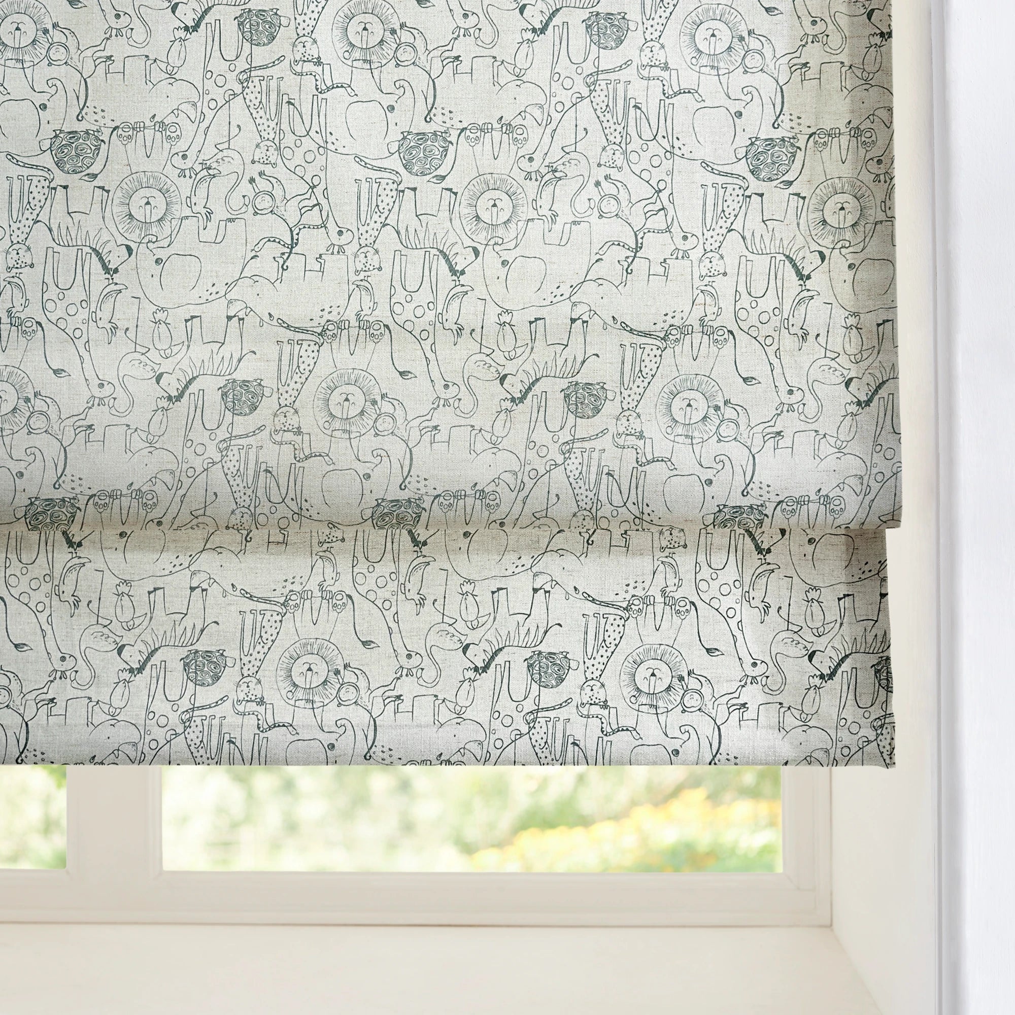 Wynara Black Safari Animal Sketch Blackout Roman Shades: Image 1388-16_scene_4 showcases the roman shade with stylish safari animal sketch design, excellent blackout performance and elegant home scene coordination.