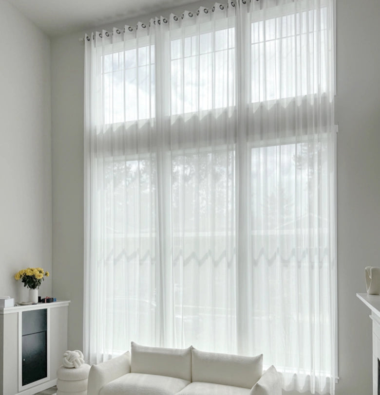 Semi sheer curtains offering a perfect balance of light and privacy for any room