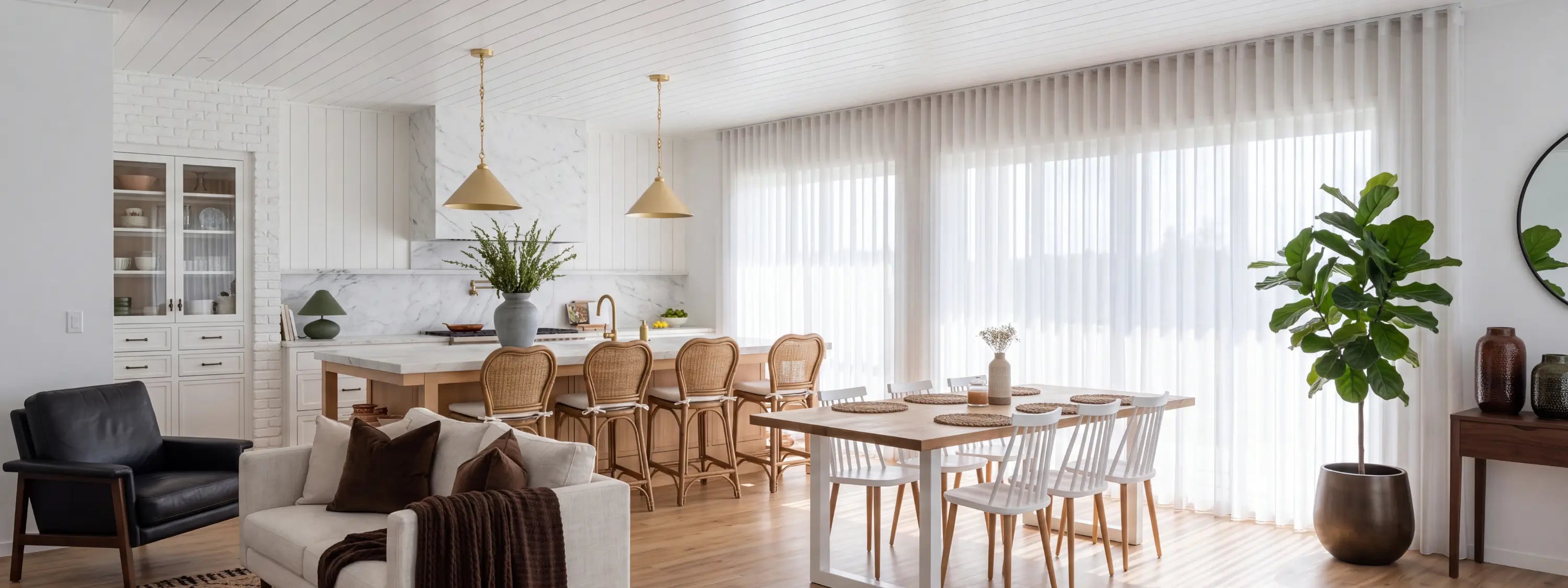 See through sheer curtains softly filtering light, creating a bright and airy ambiance.