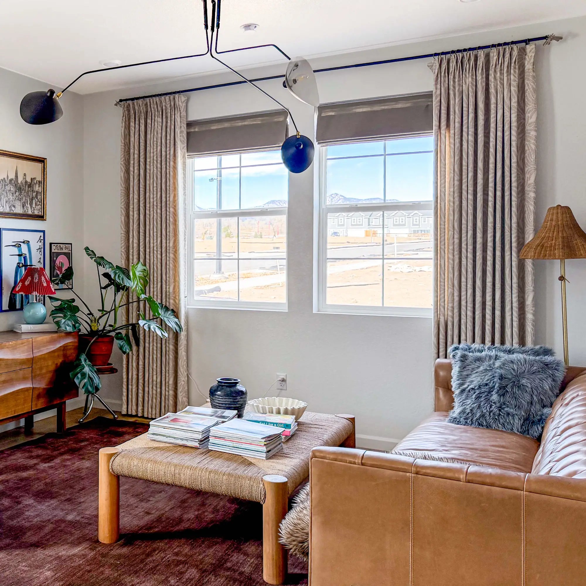 Celina 8823-20-4 Roman shades fully open in a modern living room view 3