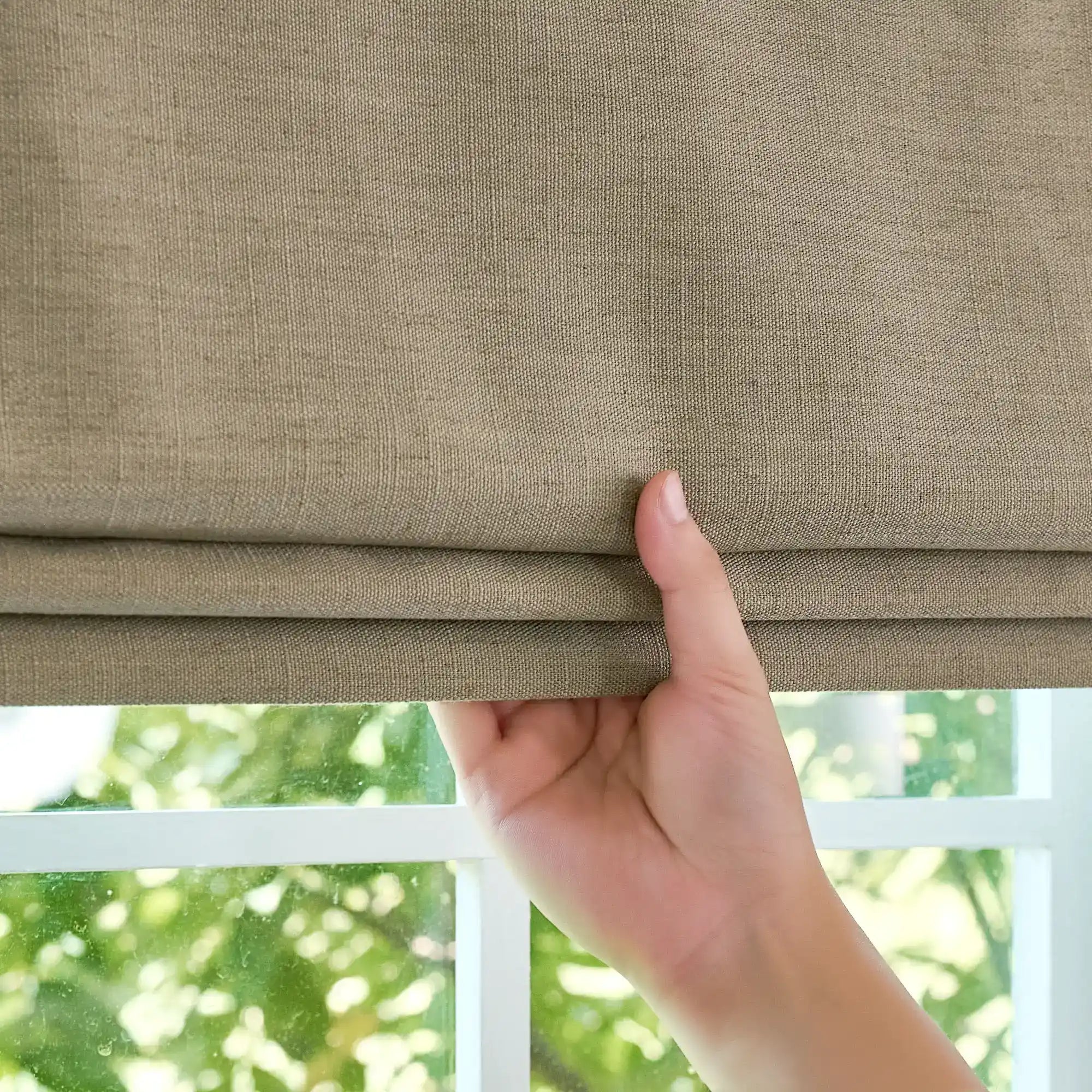 Celina Pale Olive Green Linen Curtains: Image 8823-20_scene_10 features the pale olive green linen roman shade with neat folds and sophisticated light control.