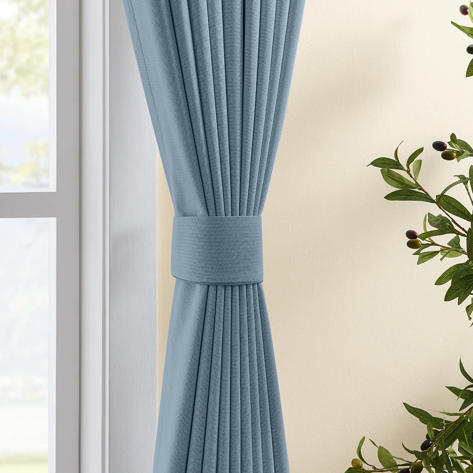 Isadora OY6-238-21 scene 6 100% blackout curtains displaying light blocking effect and elegant draping
